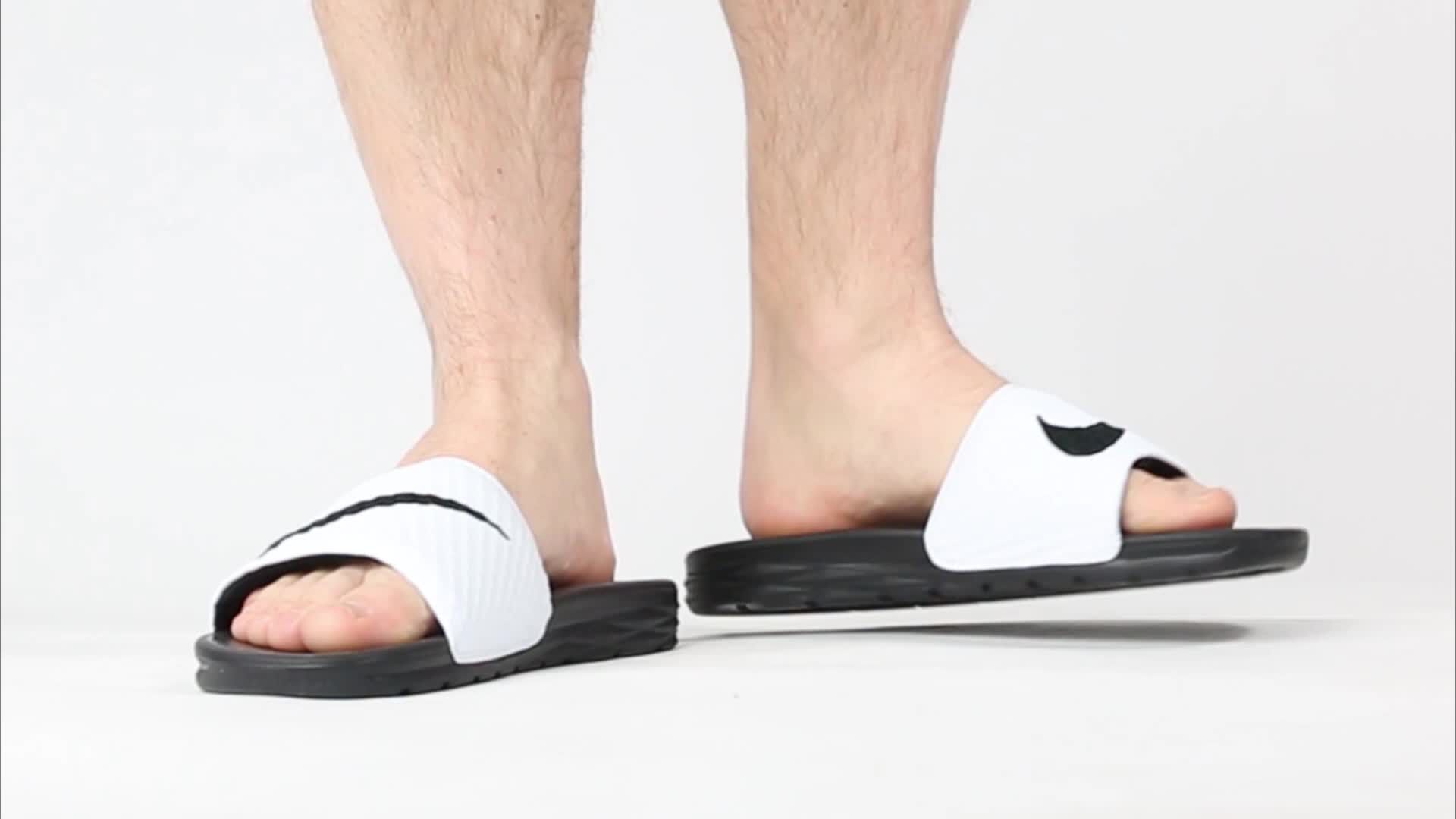 nike benassi slides on feet