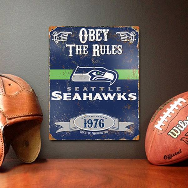 Party Animal Seattle Seahawks Embossed Metal Sign