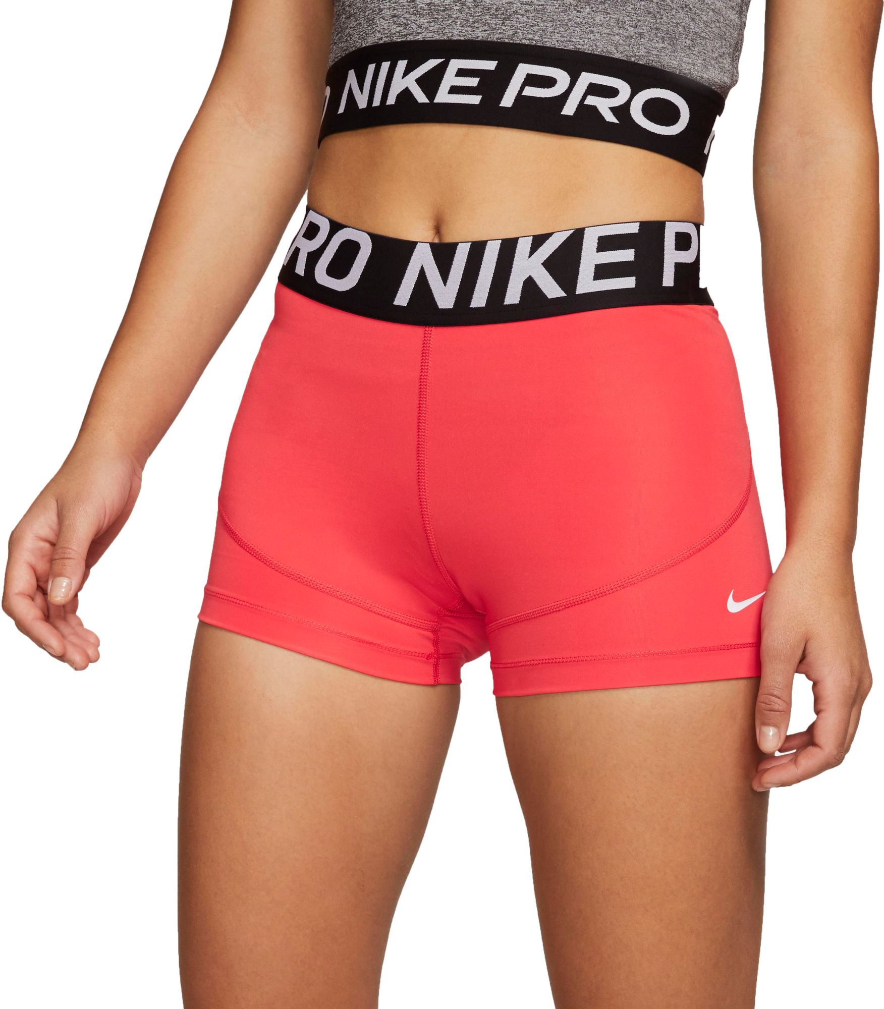 nike pro shorts orange and black