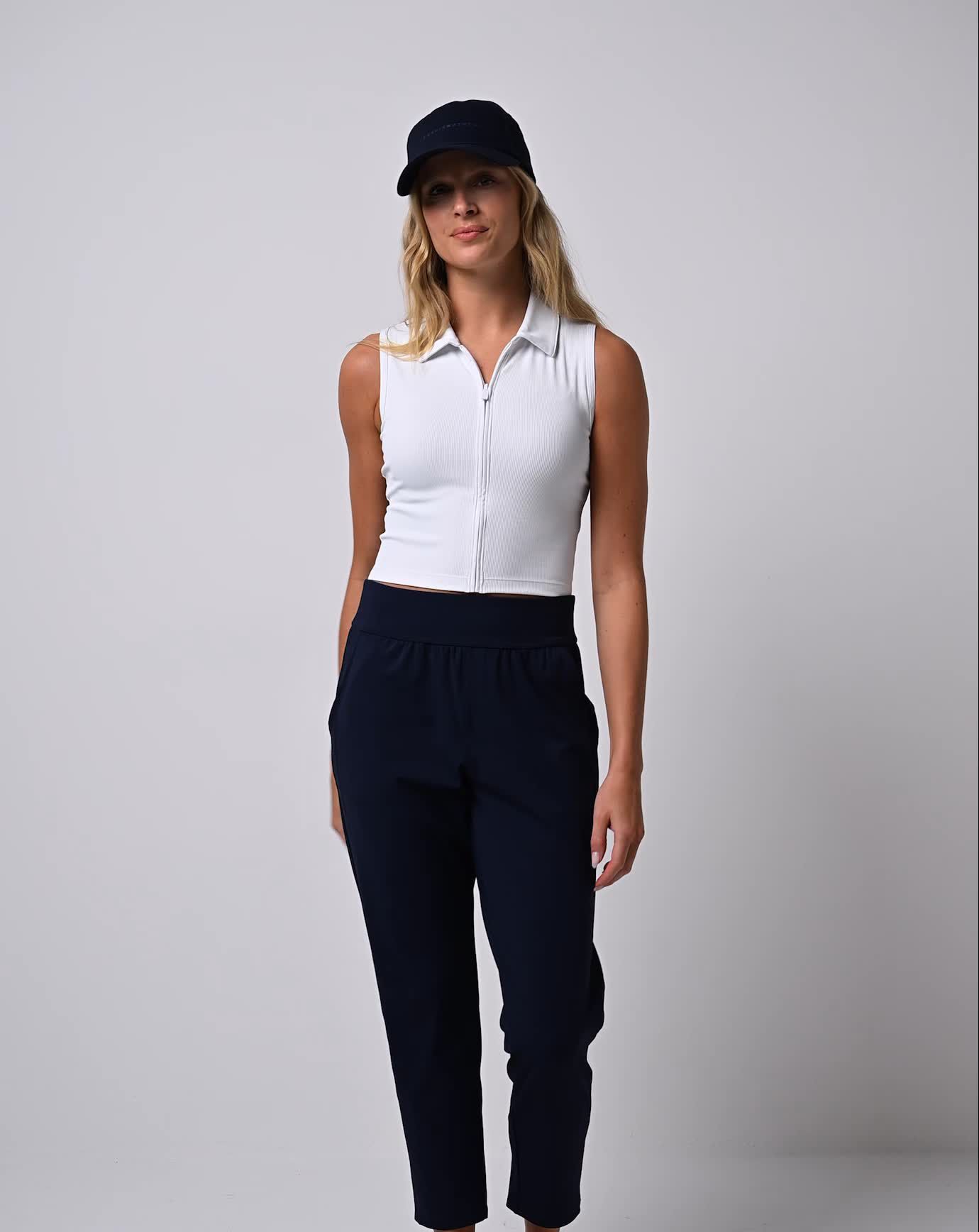 TravisMathew Women's Midline MoveKnit Sleeveless Golf Polo product