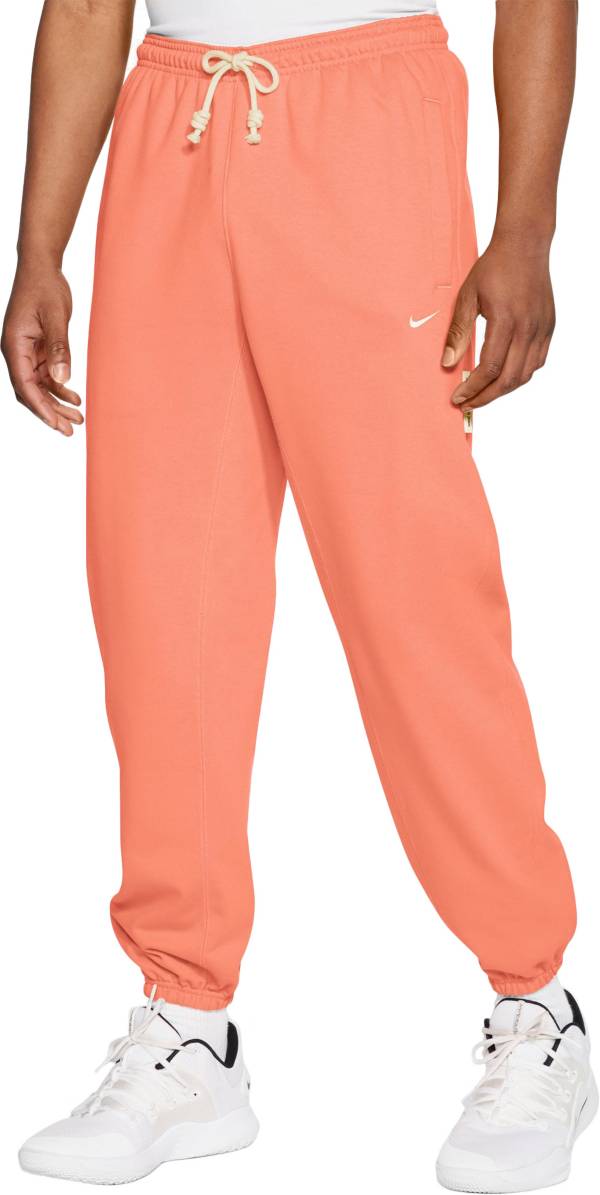 orange nike sweat pants