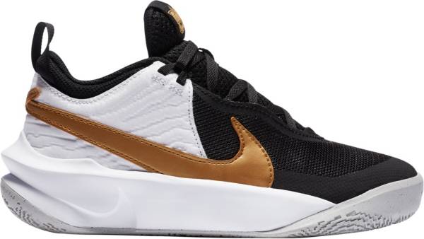 Nike black white hot sale and gold shoes