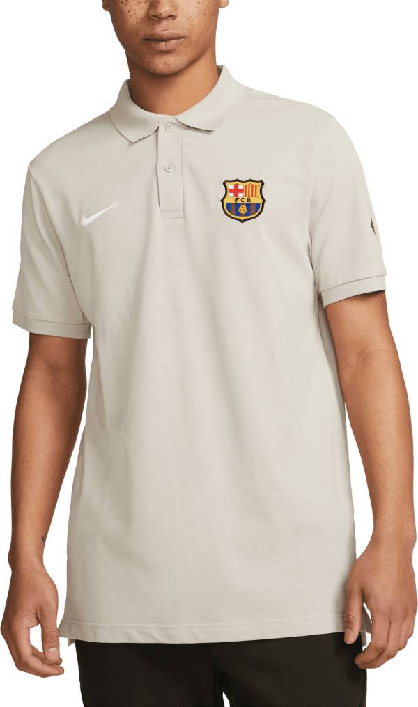 Strengt Indrømme ujævnheder Nike FC Barcelona 2023 Logo Tan Polo | Dick's Sporting Goods