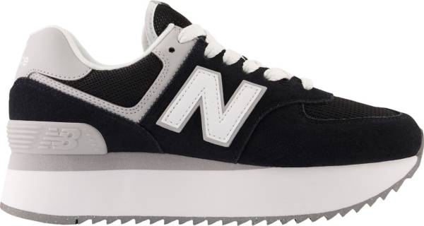 New Balance 574 sneakers in white with black detail