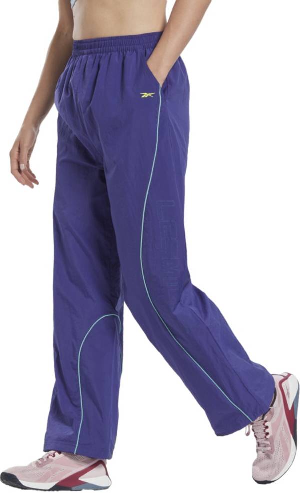 Buy Reebok Womens Les Mills Woven Track Pants Bold Purple