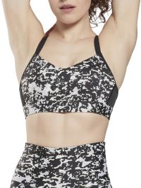 REEBOK Lux Strappy Modern Safari Print Medium Impact Sports Bra in Black