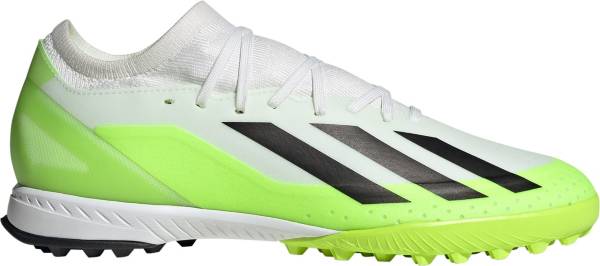 White and cheap green soccer cleats