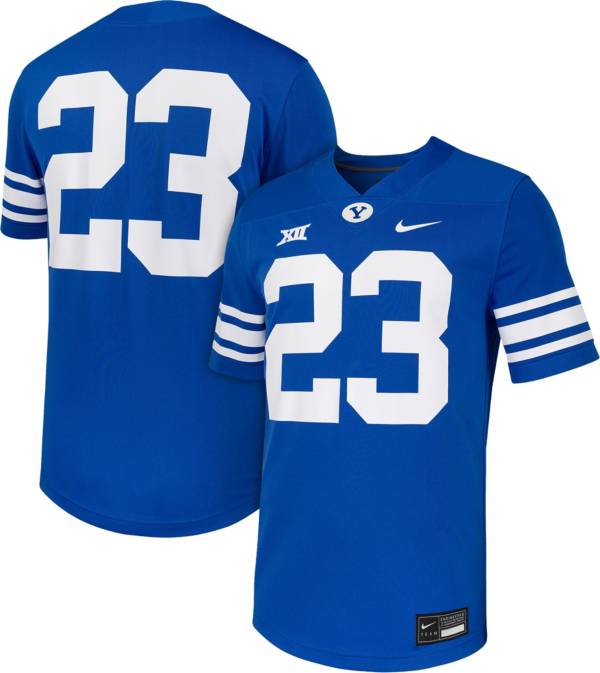 Byu football uniforms with the jersey being royal blue and side stripes  cougar tan. the helmets are cougar tan with a royal blue block cougar logo  on Craiyon