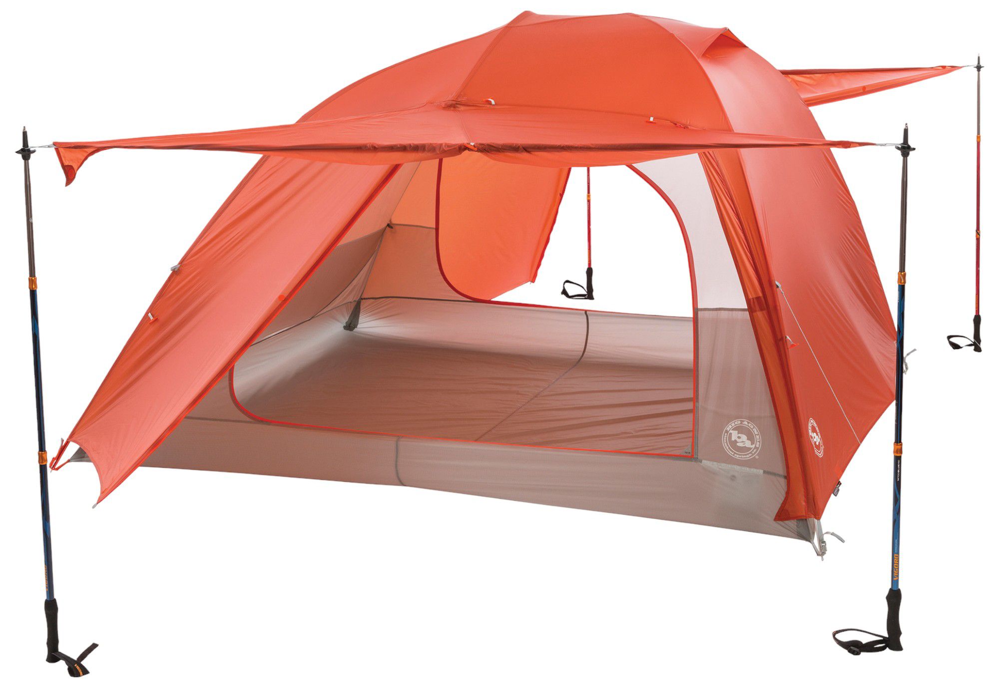 A large orange tent with long black stakes