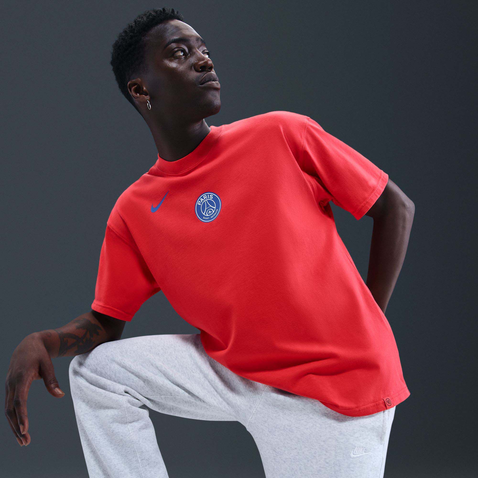 Nike Men's Paris Saint-Germain 2025 Red T90 Wordmark T-Shirt product image