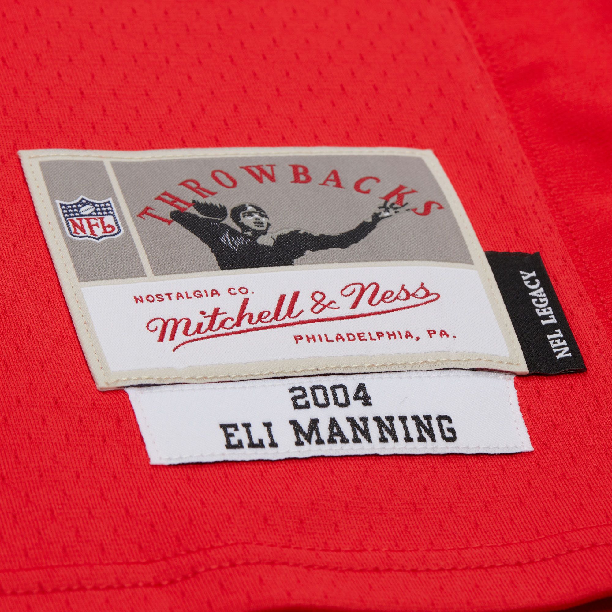 Mitchell & Ness Men's New York Giants Eli Manning #10 Red 2004 Replica Football Jersey product image