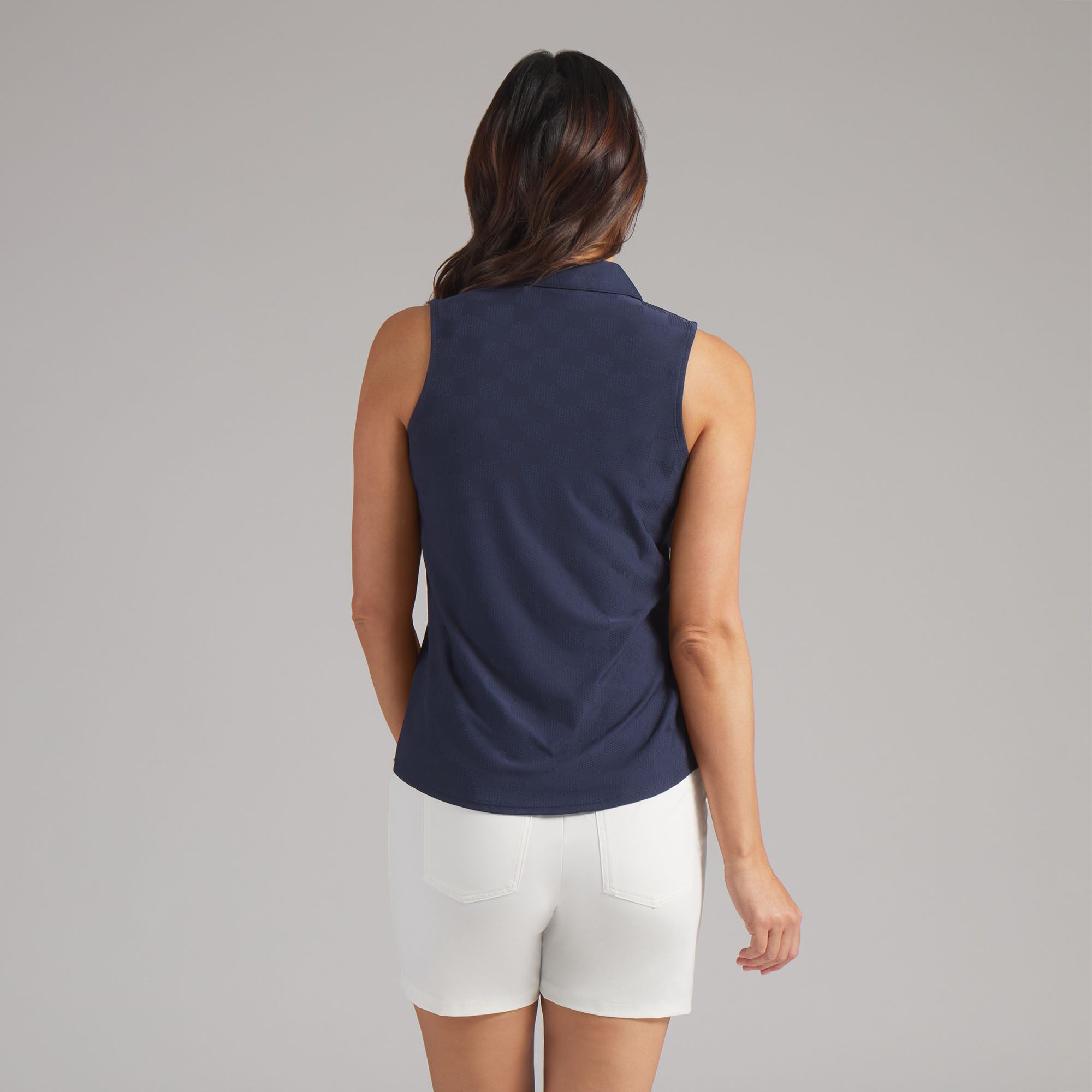 PUMA Women's Check Jacquard Sleeveless Golf Polo product image