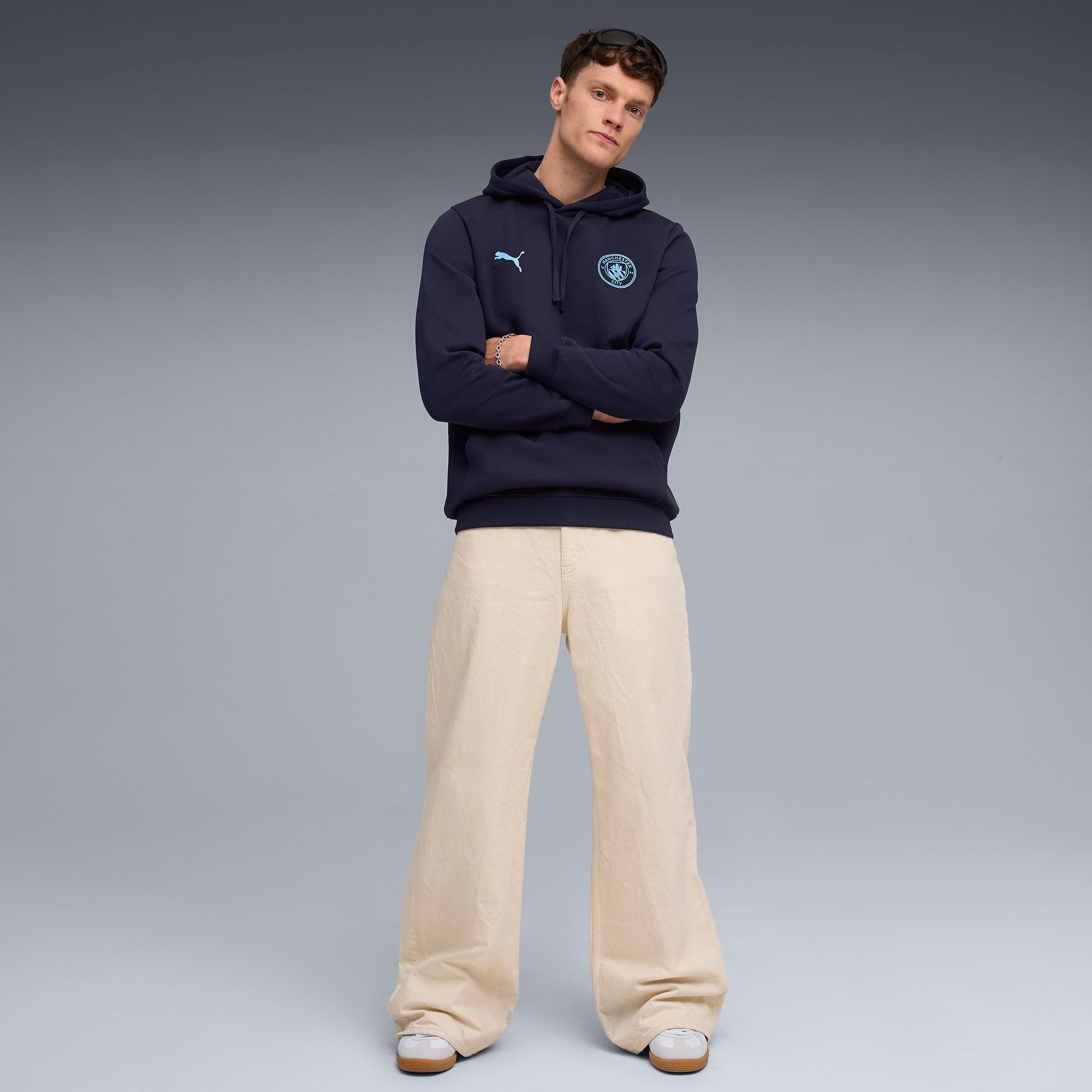 PUMA Men's Manchester City Navy Team Logo Pullover Hoodie product image