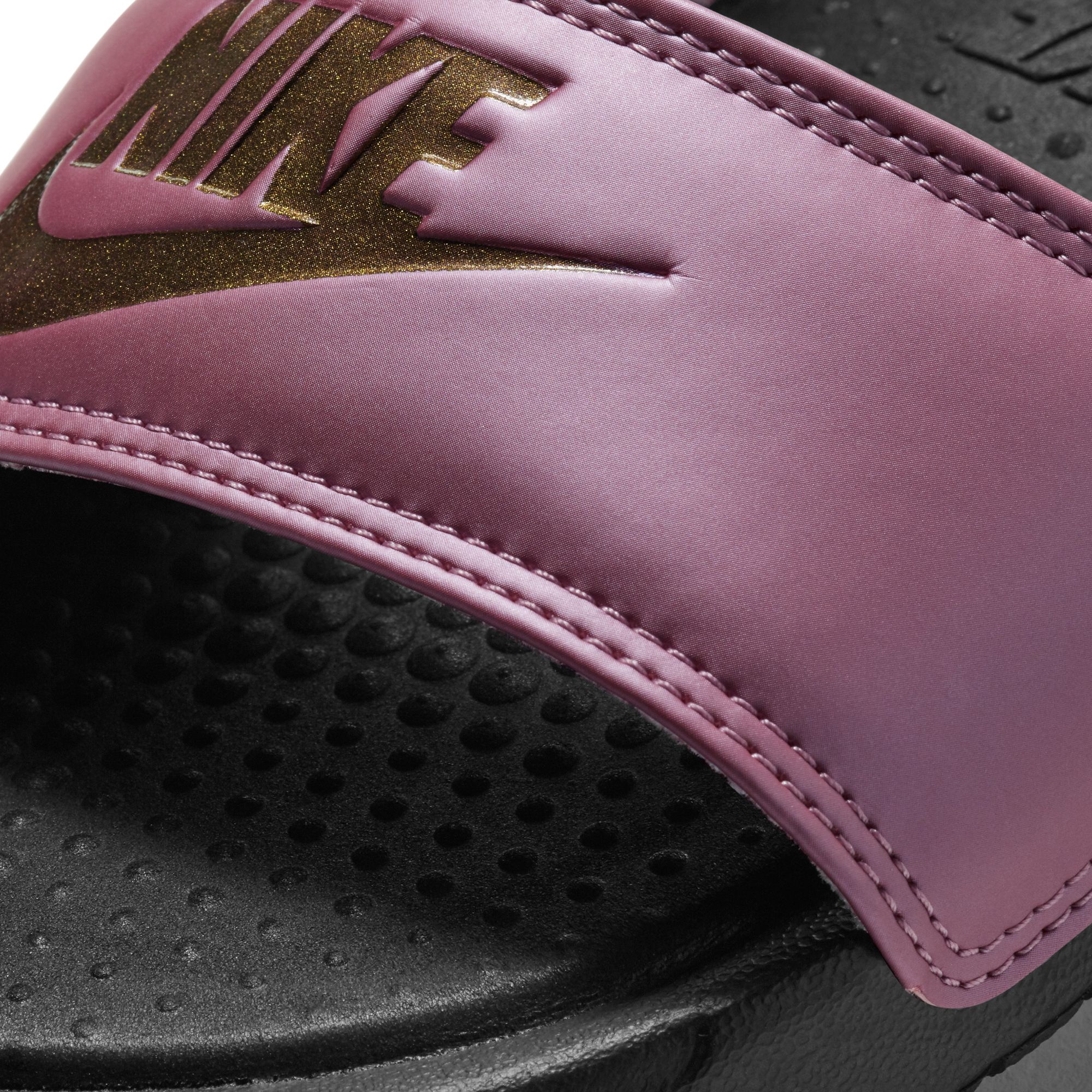 purple and gold nike slides