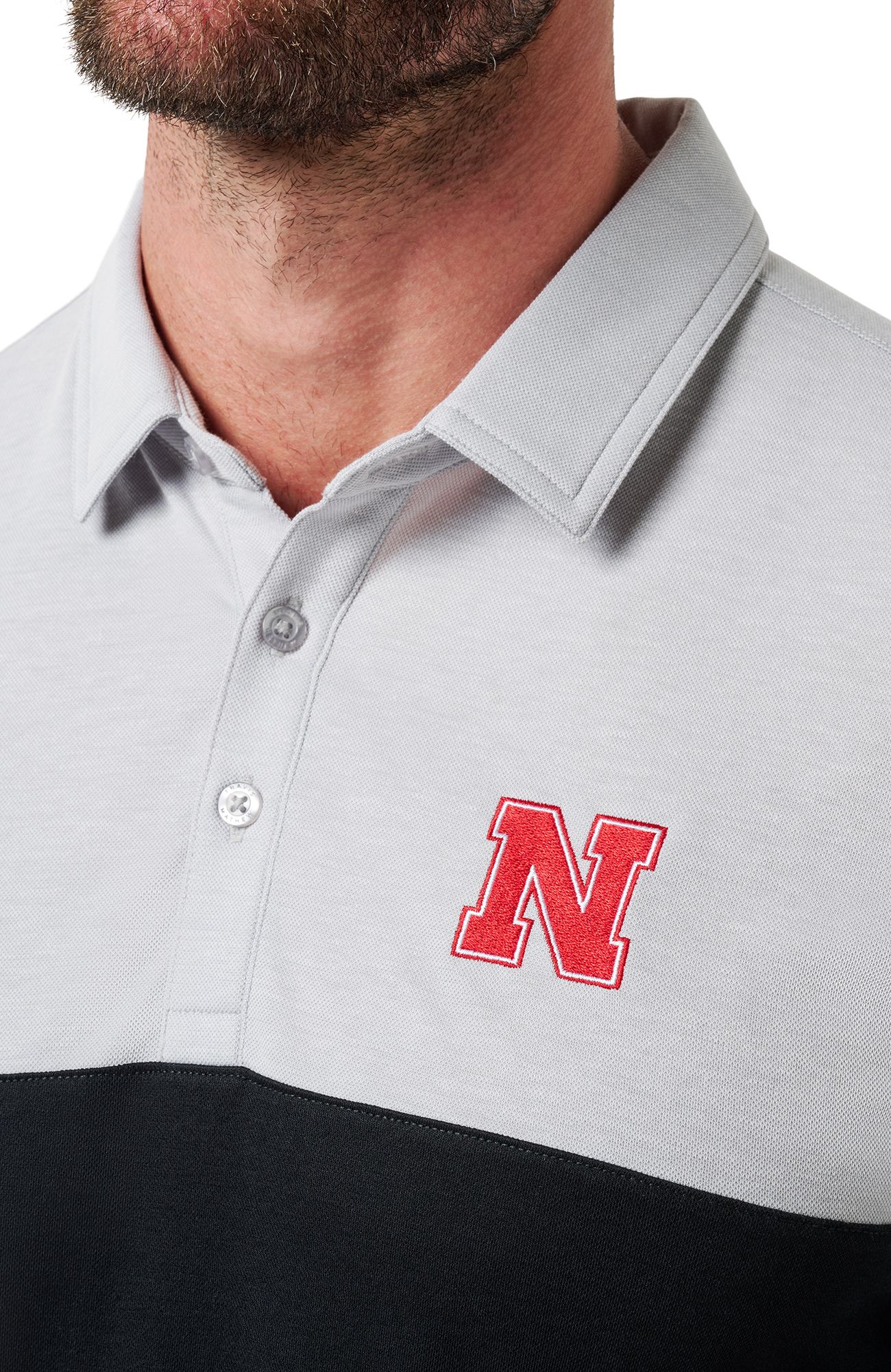 TravisMathew Men's Nebraska Cornhuskers Heather Grey Drop Back Polo product image
