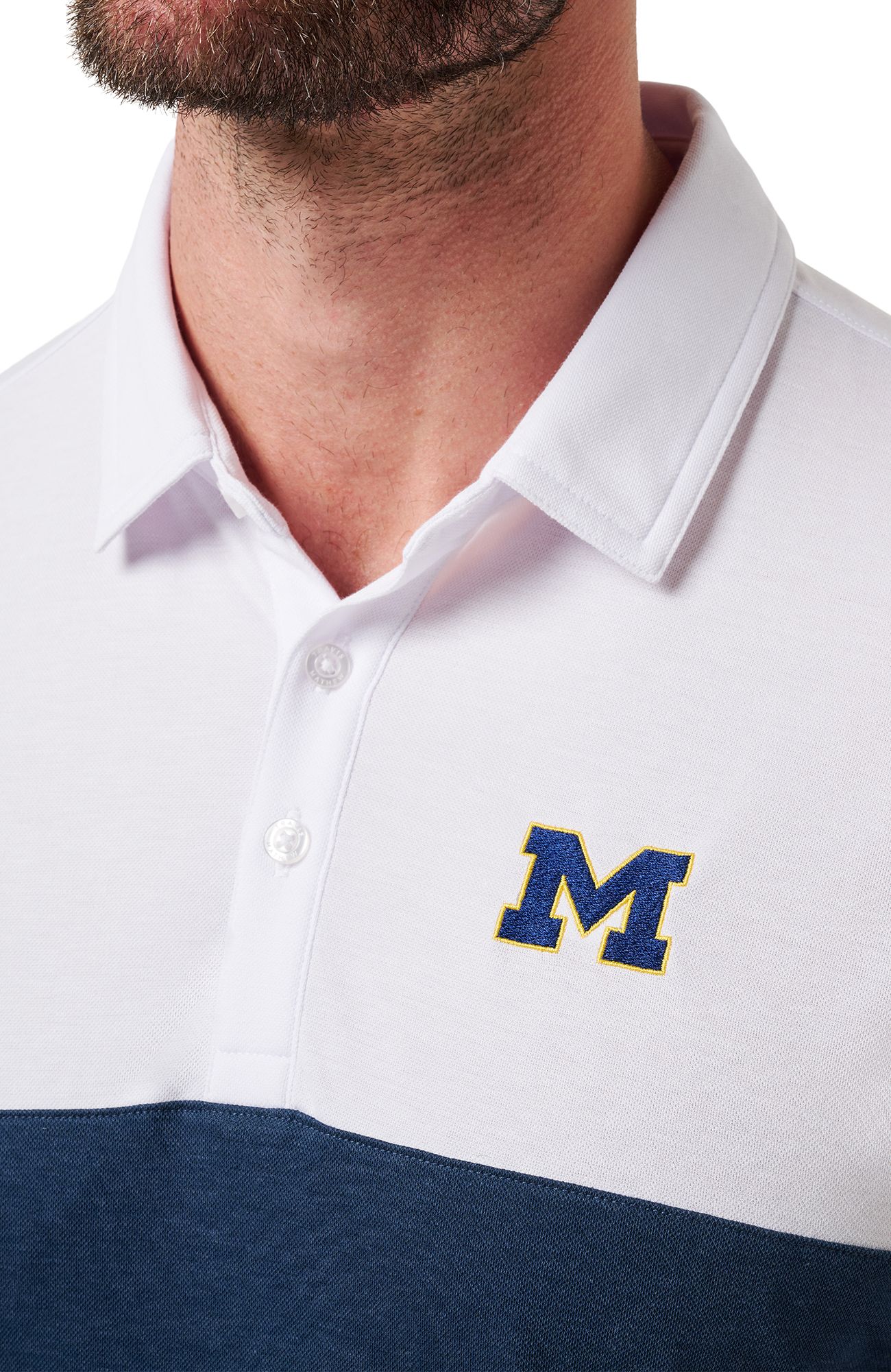 TravisMathew Men's Michigan Wolverines White Drop Back Polo product image