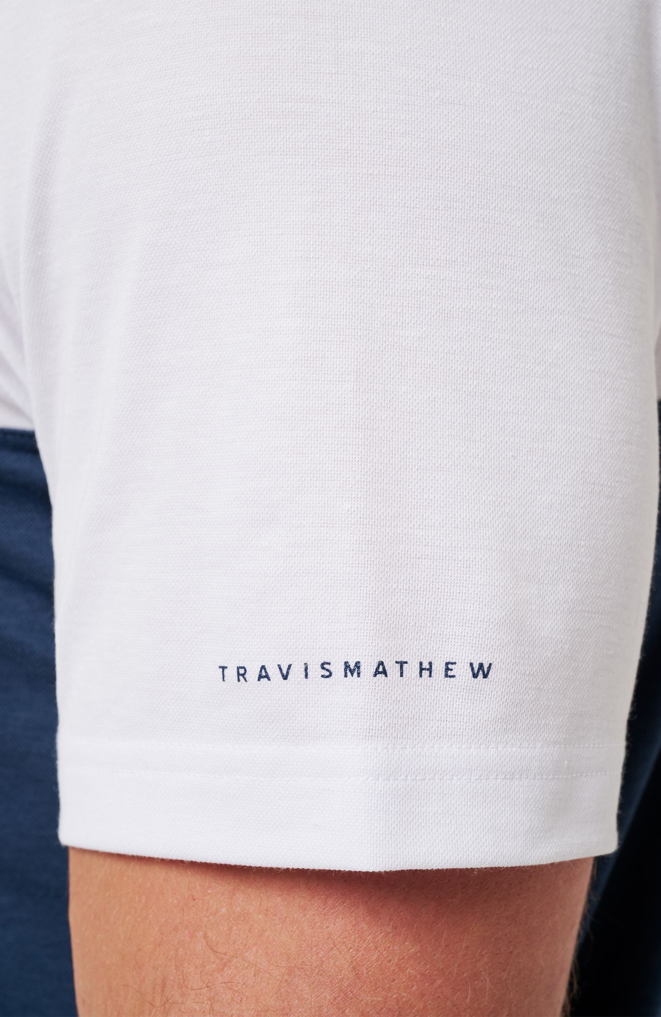 TravisMathew Men's Michigan Wolverines White Drop Back Polo product image