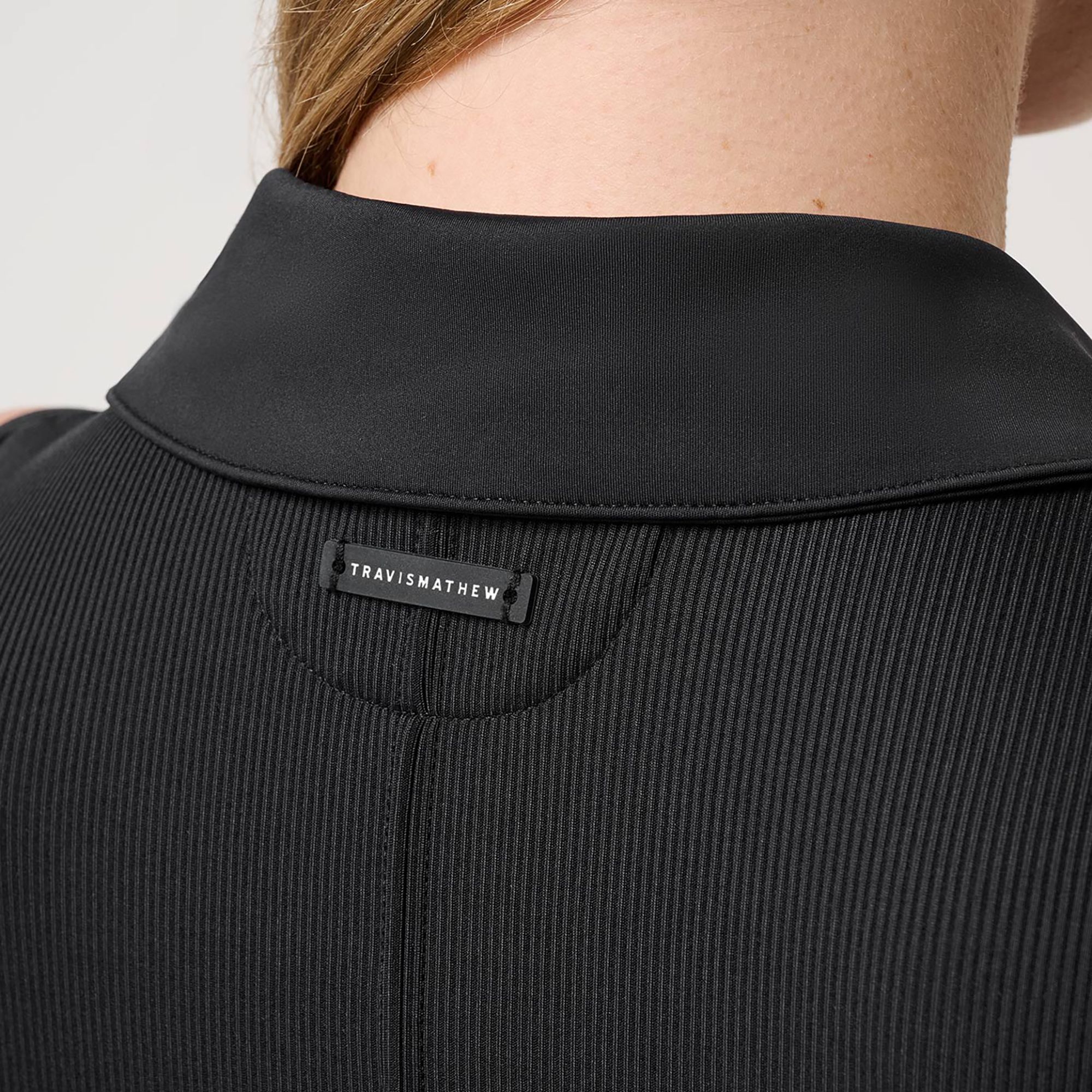 TravisMathew Women's MoveKnit Rib Sleeveless Zip Polo product image