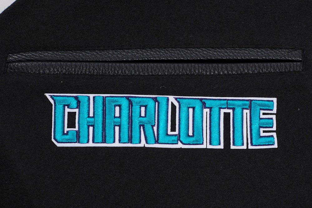 Pro Standard Men's Charlotte Hornets Black Mash Up Rib Wool Varsity Jacket product image