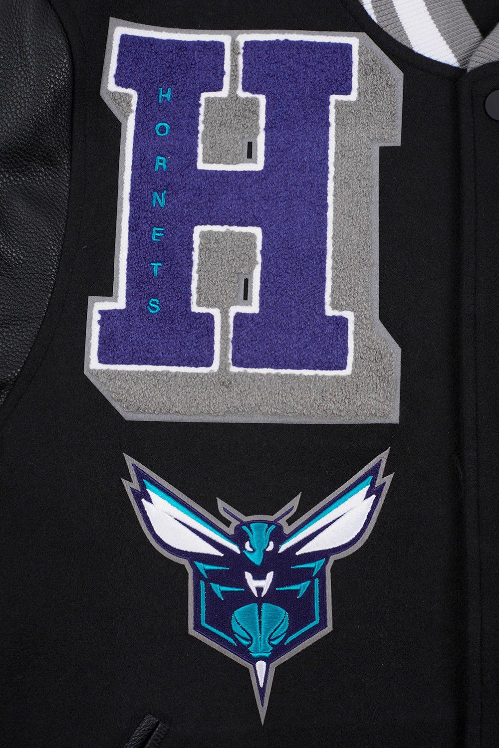 Pro Standard Men's Charlotte Hornets Black Mash Up Rib Wool Varsity Jacket product image