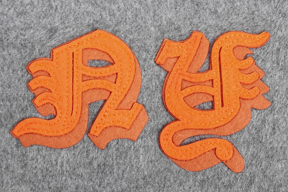 Pro Standard Men's New York Knicks Grey Old English Ribbed Wool Varsity Jacket product image