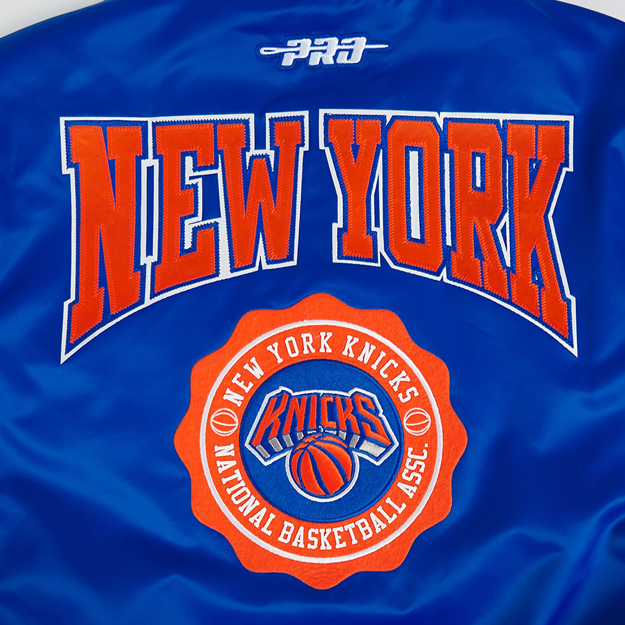 Pro Standard Women's New York Knicks Blue Crest Emblem Full-Zip Satin Jacket product image