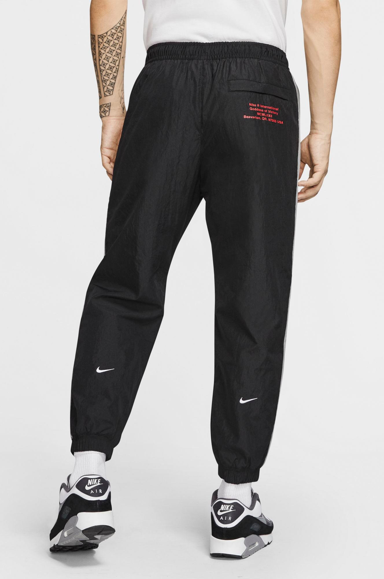 double nike swoosh pants