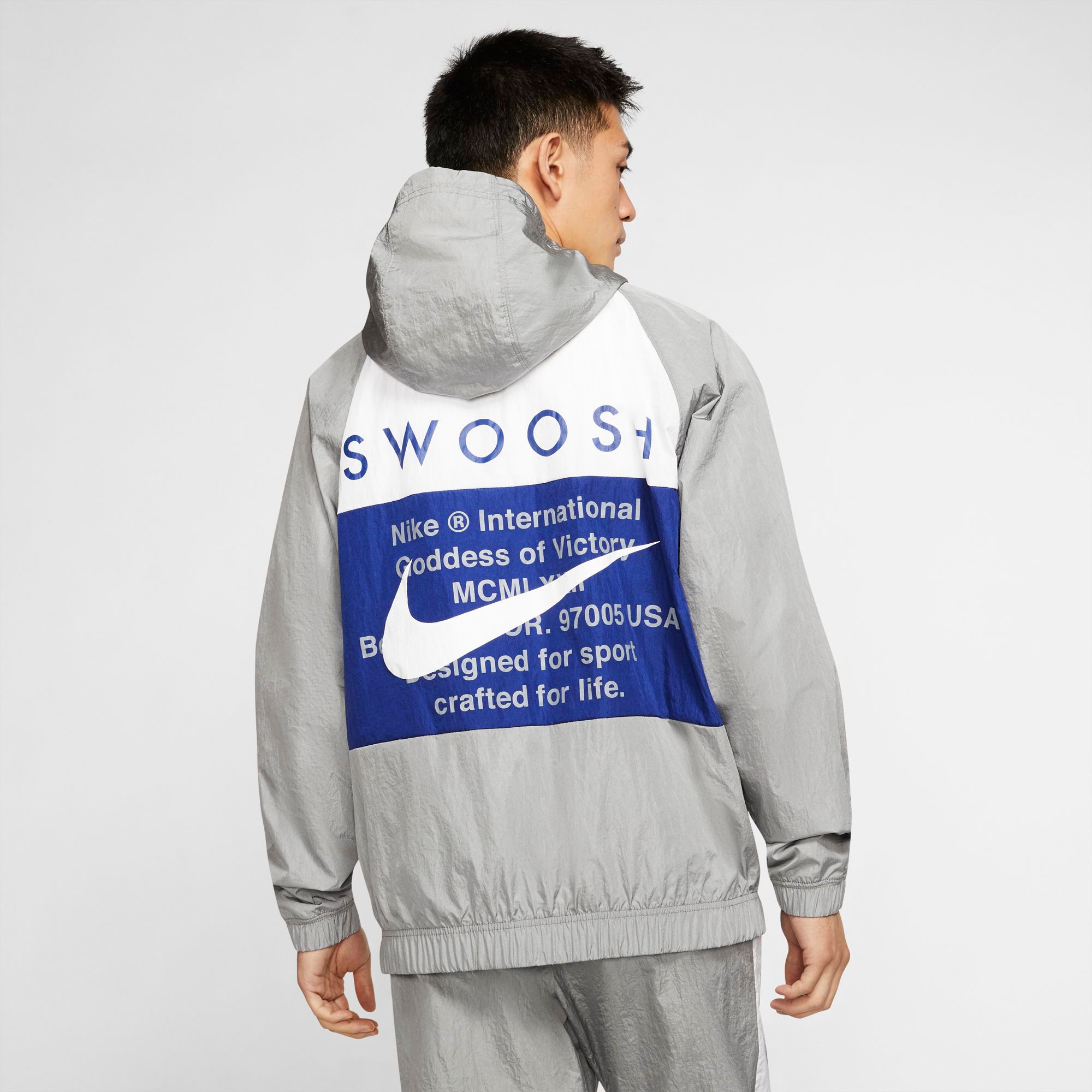 nike swoosh woven tracksuit