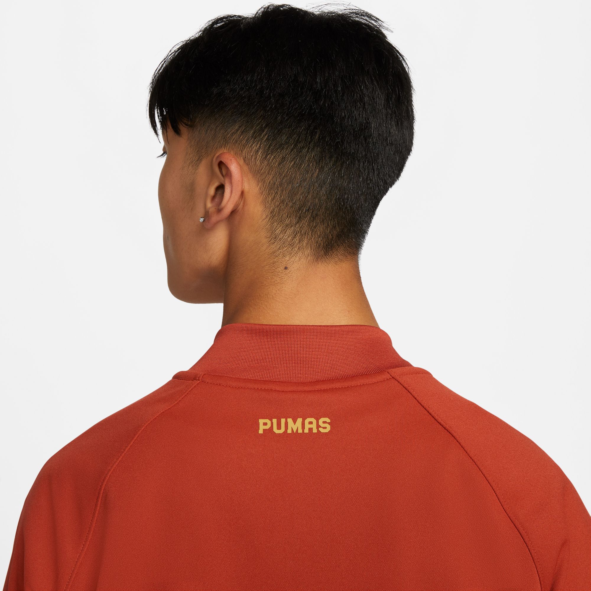 Nike Men's Pumas UNAM Anthem Orange Track Jacket product image