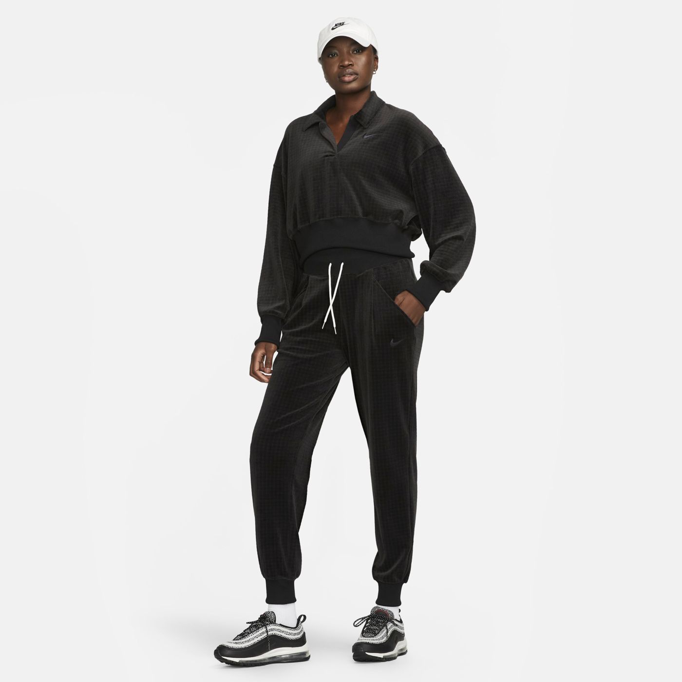 Women's nike velour tracksuit sales