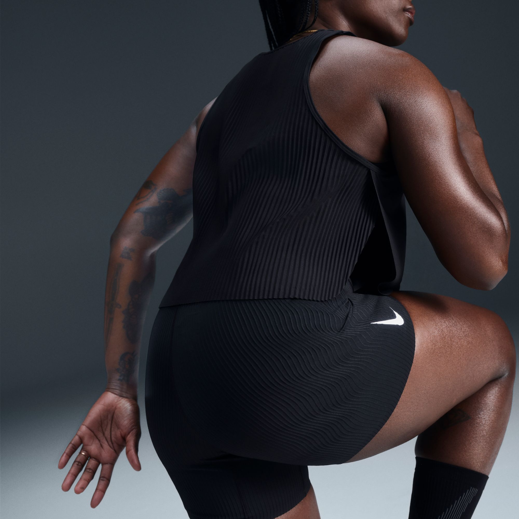 Nike Women's AeroSwift Dri-FIT ADV Cropped Running Tank Top product image