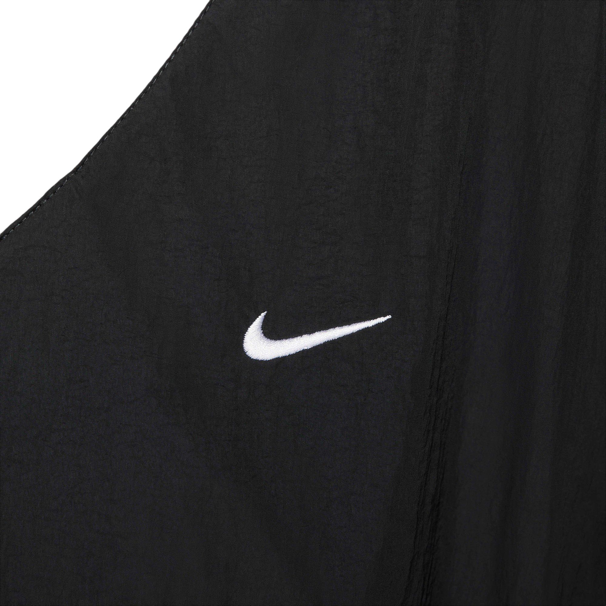 Nike Women's Sportswear Essential Loose UV Woven Long-Sleeve V-Neck Top product image