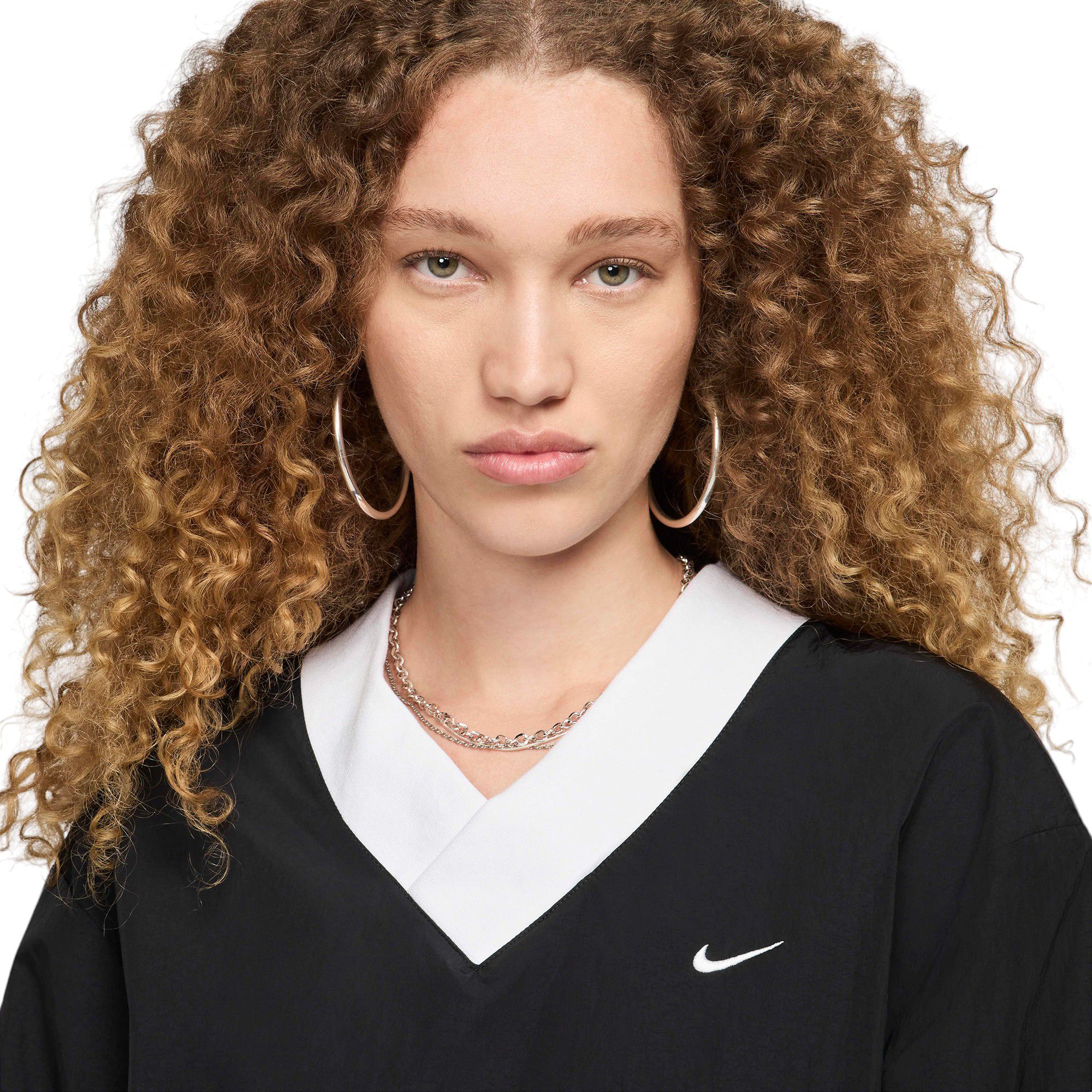 Nike Women's Sportswear Essential Loose UV Woven Long-Sleeve V-Neck Top product image