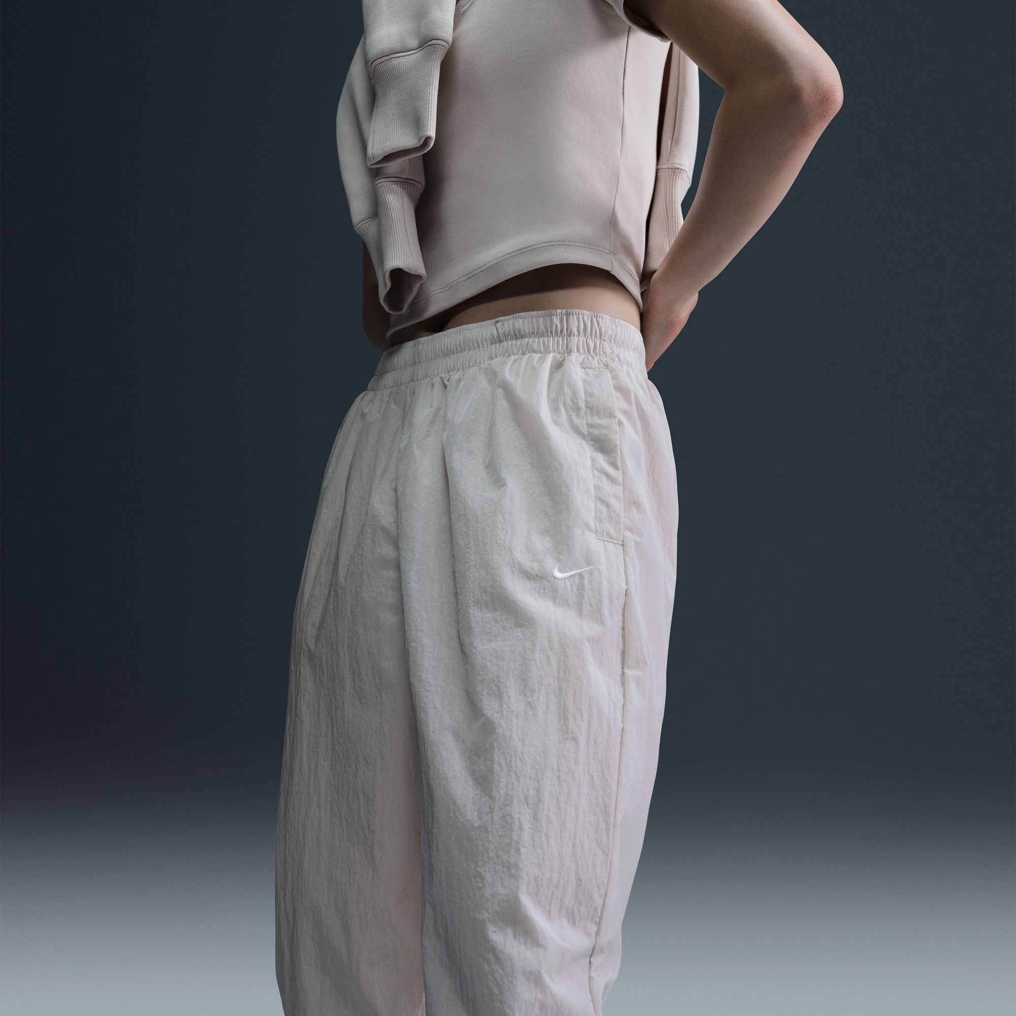 Nike Women's Sportswear Essential Mid-Rise Oversized Woven Joggers product image