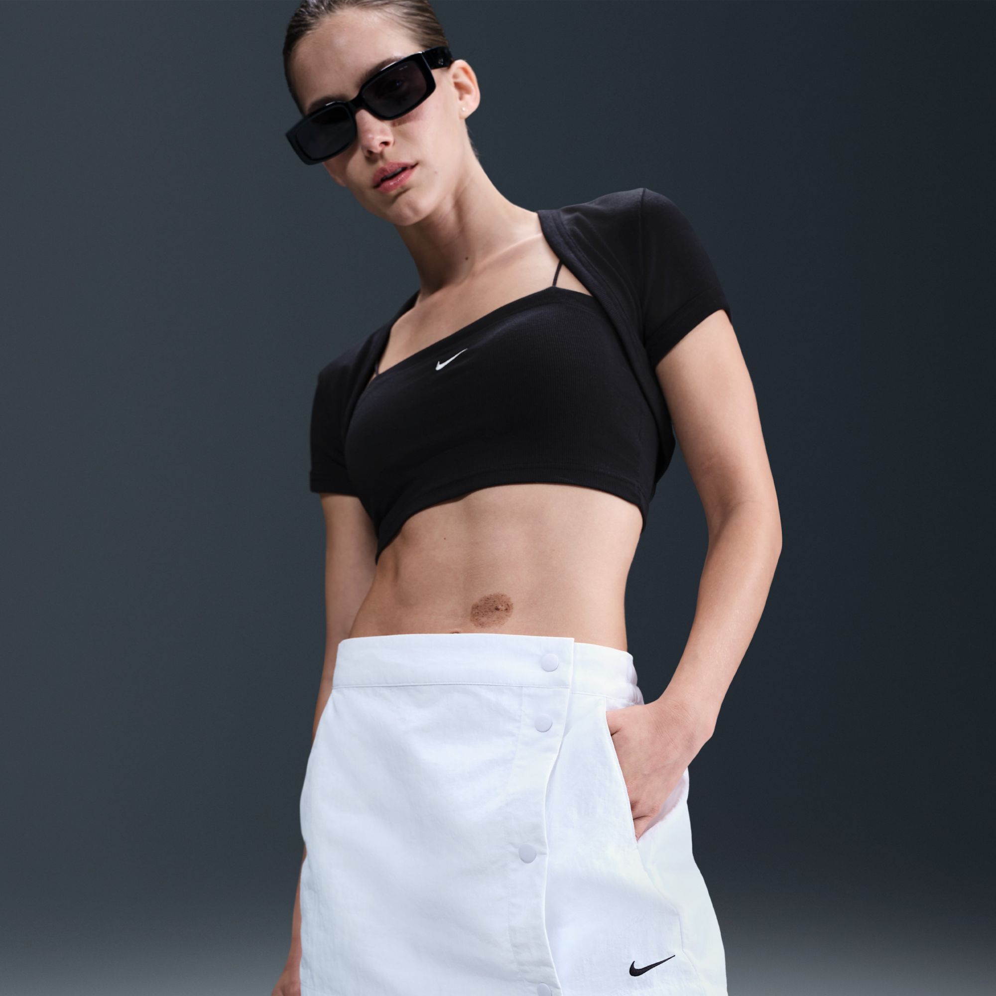 Nike Women's Sportswear Essential 3" Mid-Rise Woven Skort product image