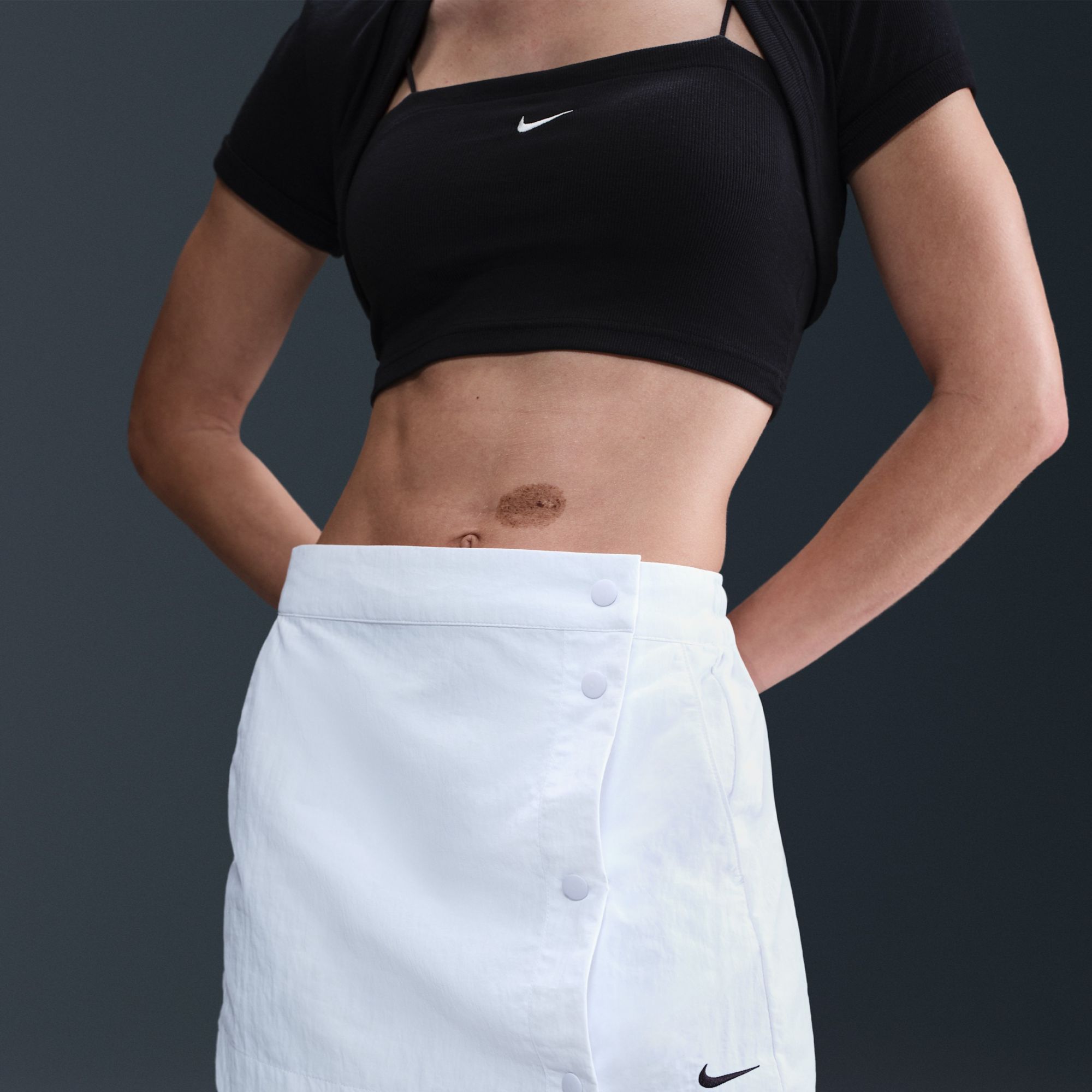 Nike Women's Sportswear Essential 3" Mid-Rise Woven Skort product image