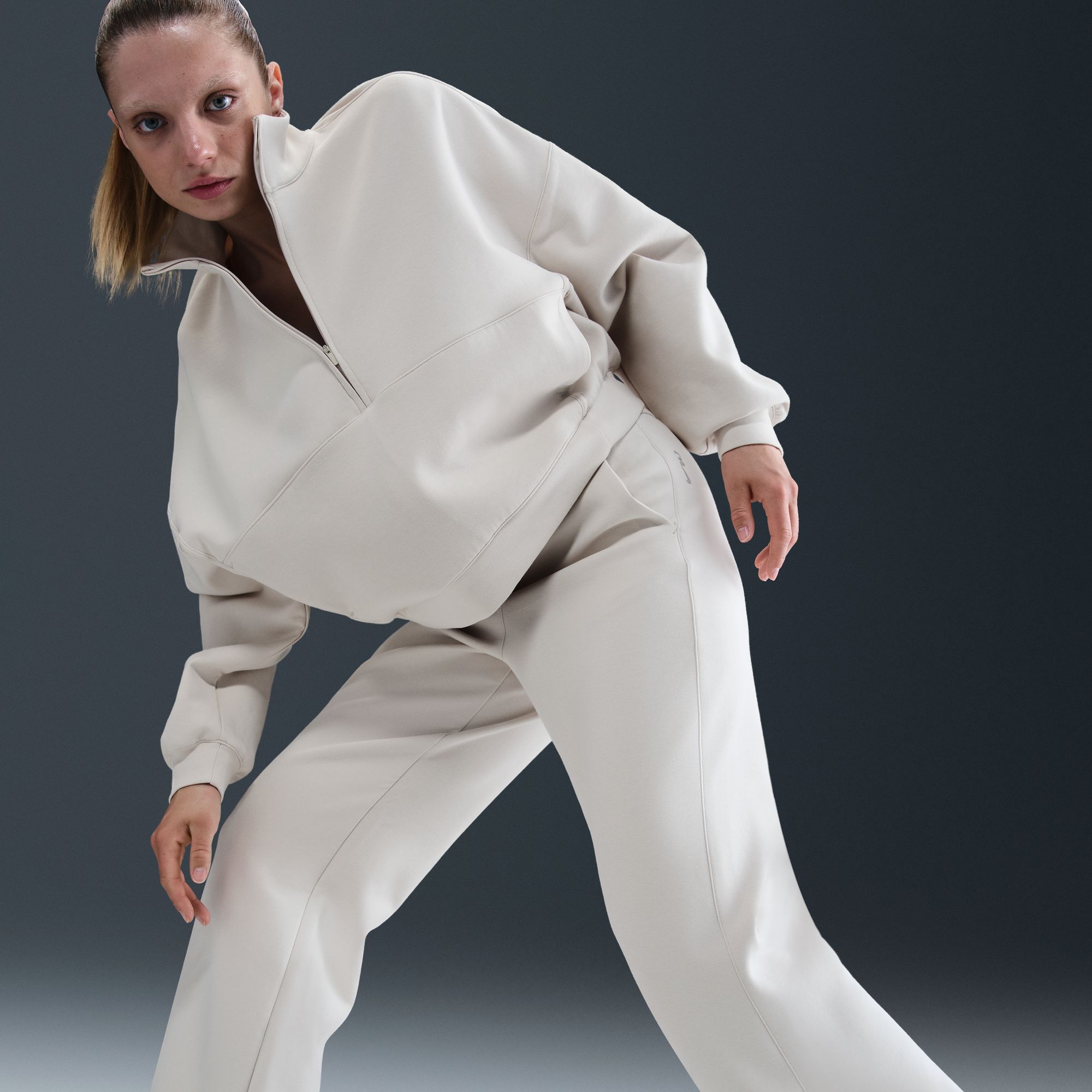 Nike Women's 24.7 ImpossiblySoft Dri-FIT High-Waisted Loose Flared Pants product image