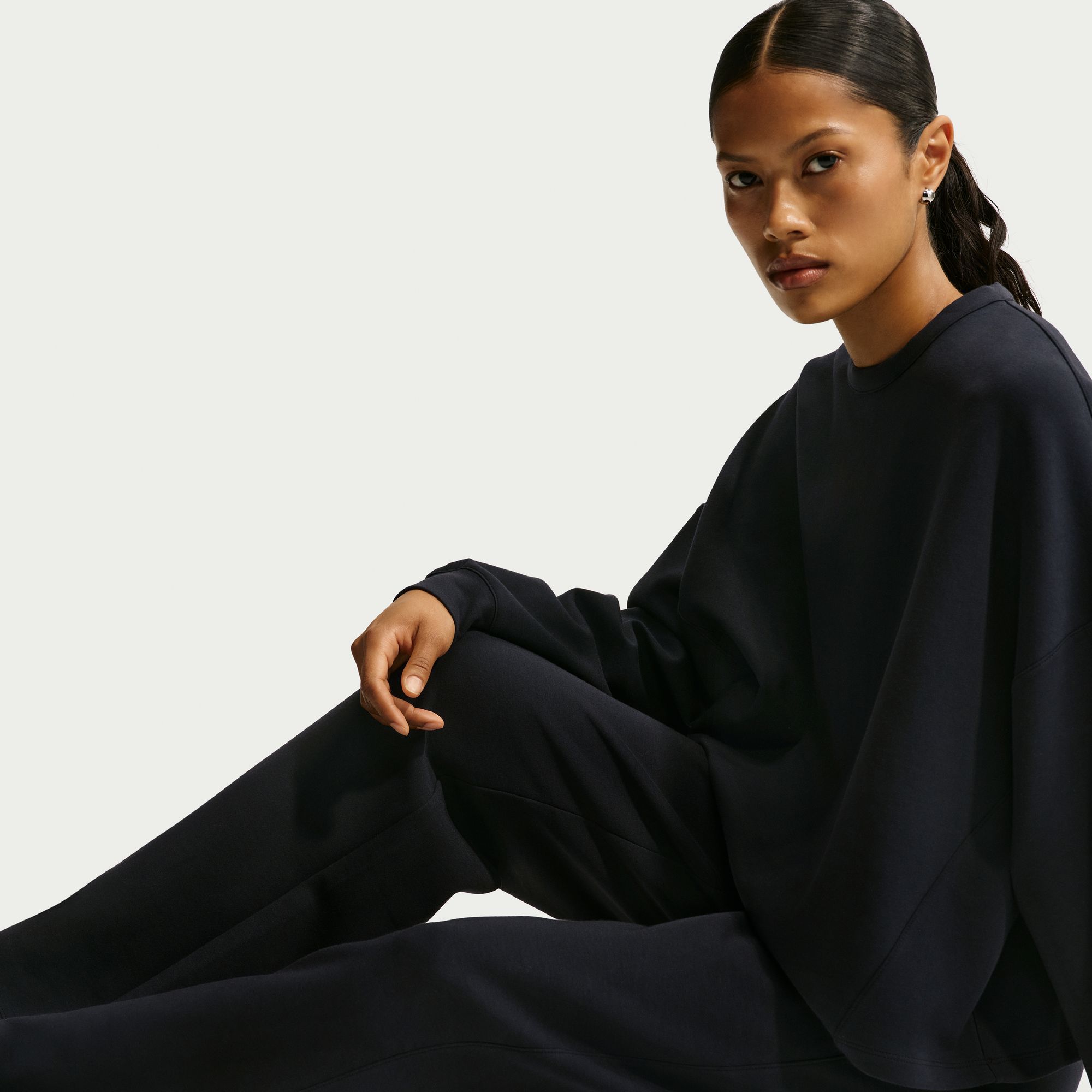 Nike Women's 24.7 ImpossiblySoft Dri-FIT High-Waisted Loose Flared Pants product image