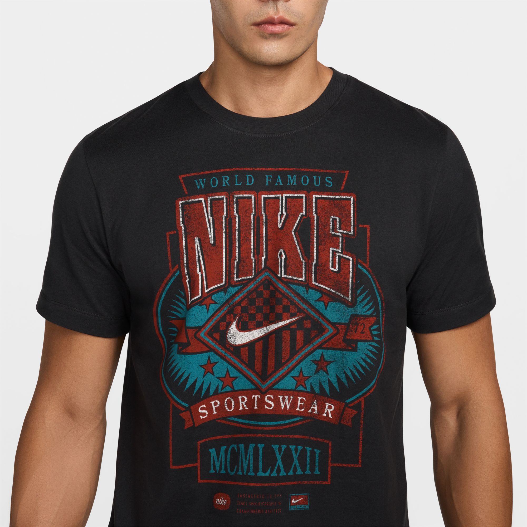 Nike Men's Sportswear Vintage World Famous Graphic T-Shirt