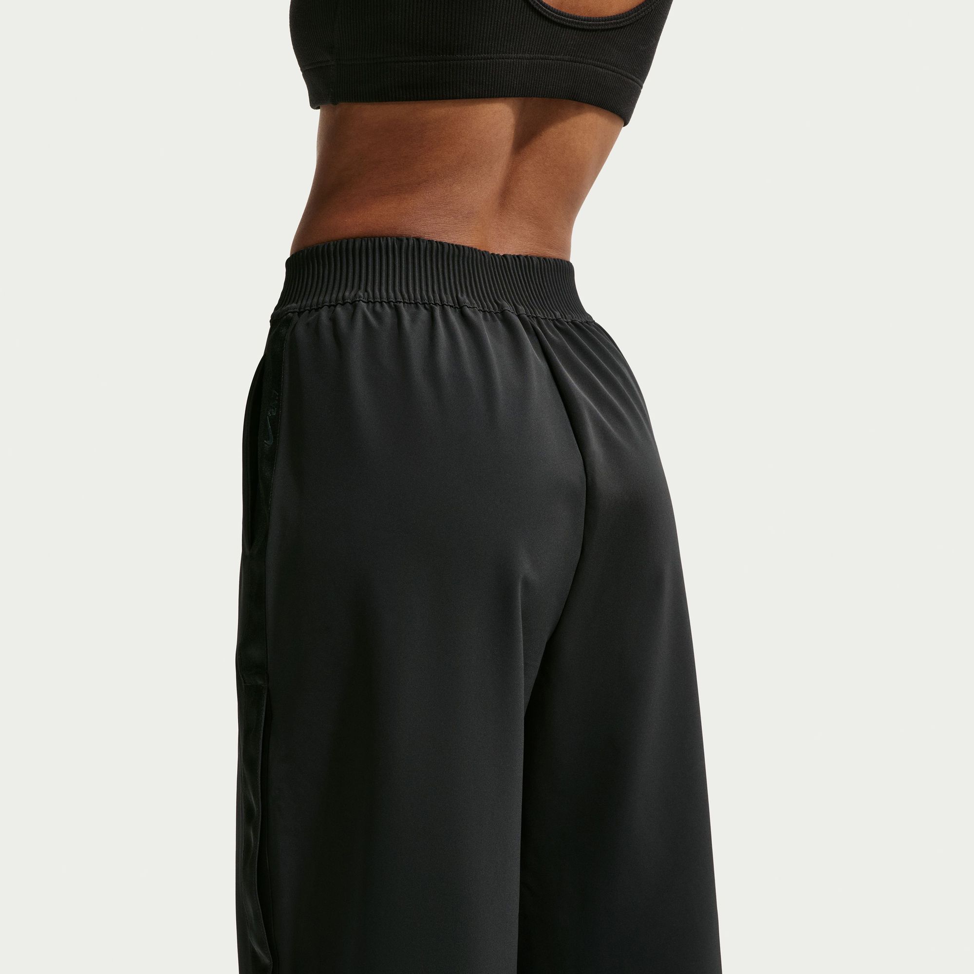 Nike Women's 24.7 PerfectStretch Dri-FIT Tearaway Pants product image