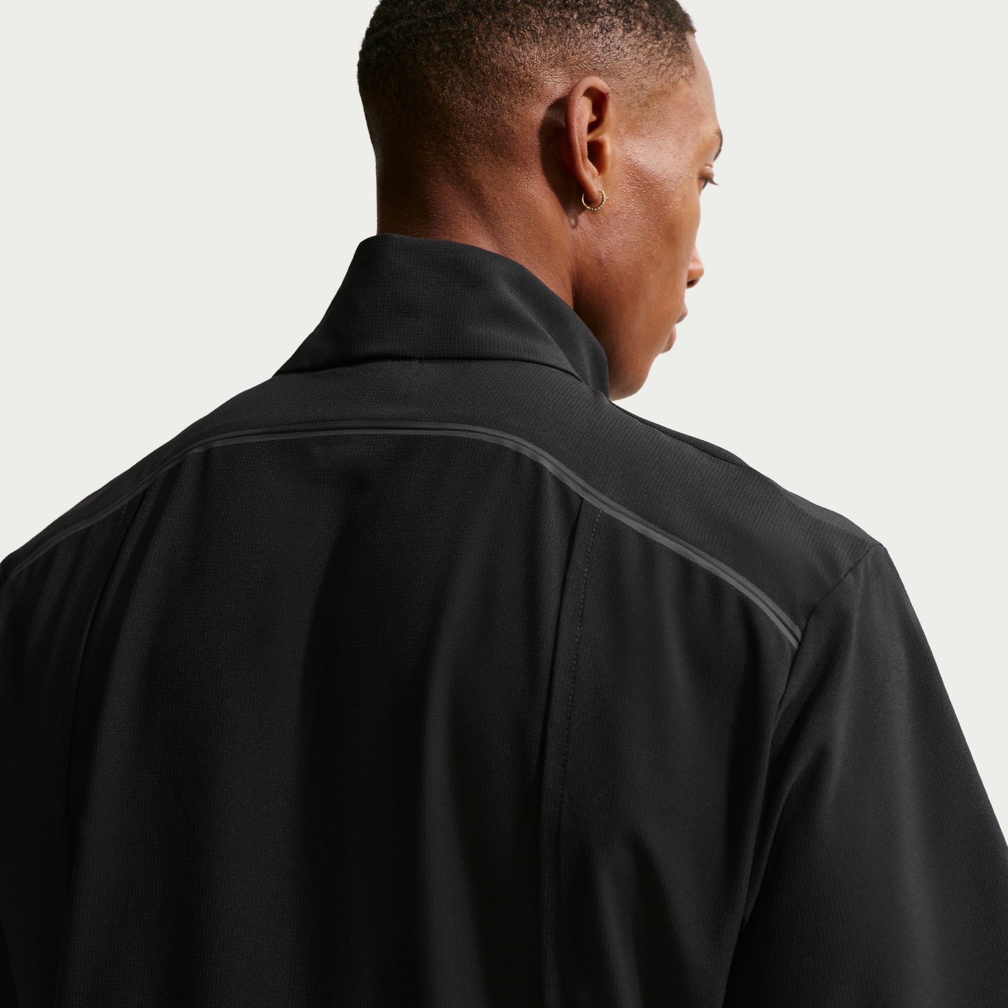 Nike Men's Tailored Performance Dri-FIT Loose Short Sleeve Golf Wind Shirt product image