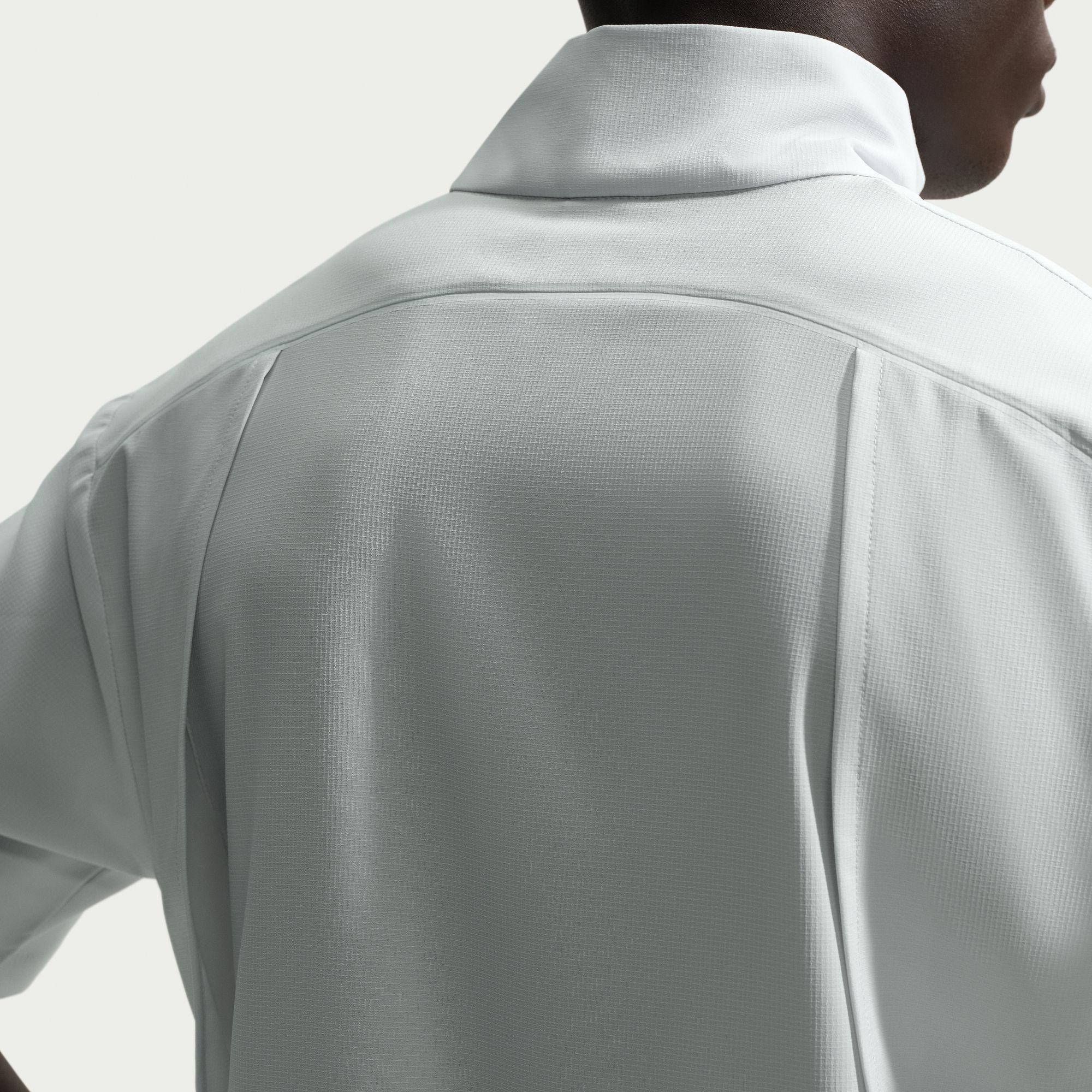 Nike Men's Tailored Performance Dri-FIT Loose Short Sleeve Golf Wind Shirt product image