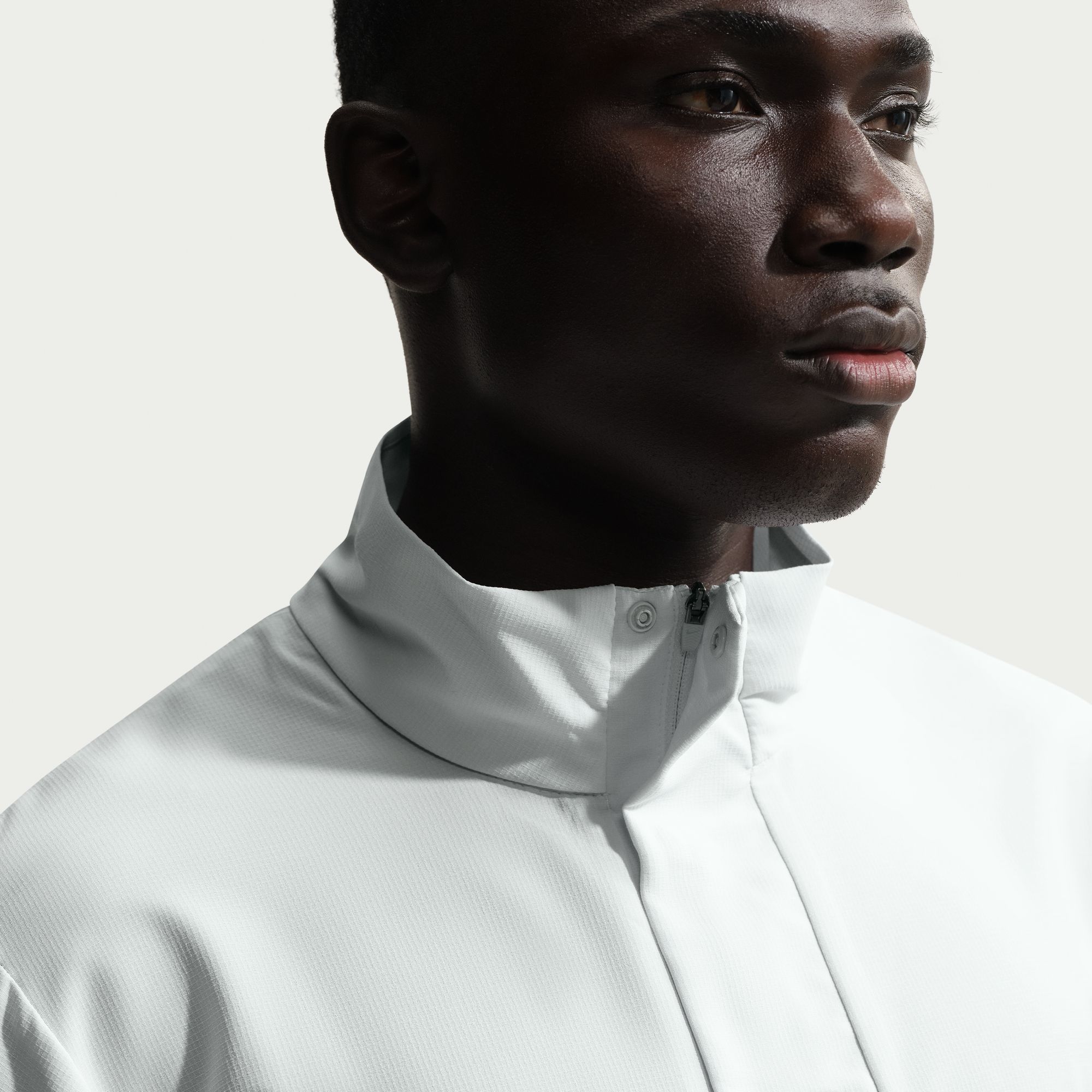 Nike Men's Tailored Performance Dri-FIT Loose Short Sleeve Golf Wind Shirt product image