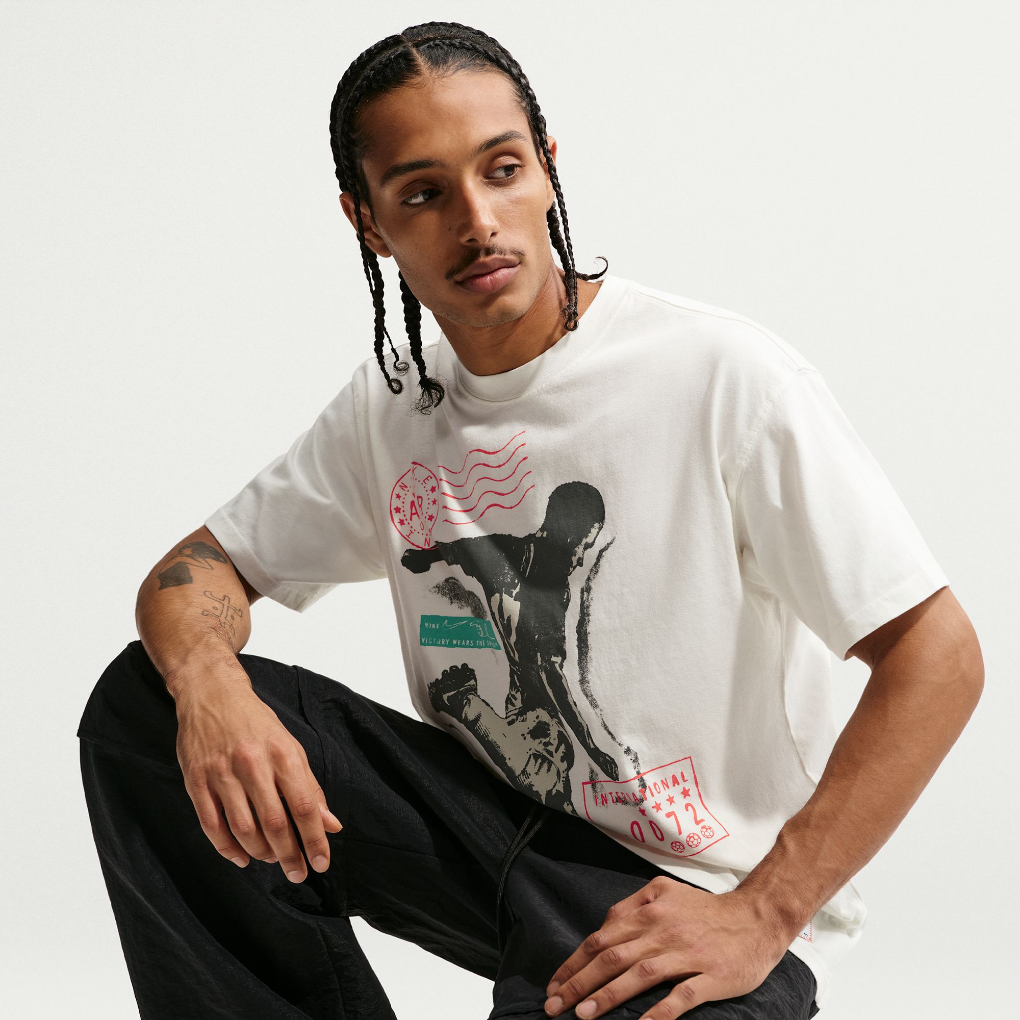 Nike Men's Sportswear International Soccer Graphic T-Shirt product image