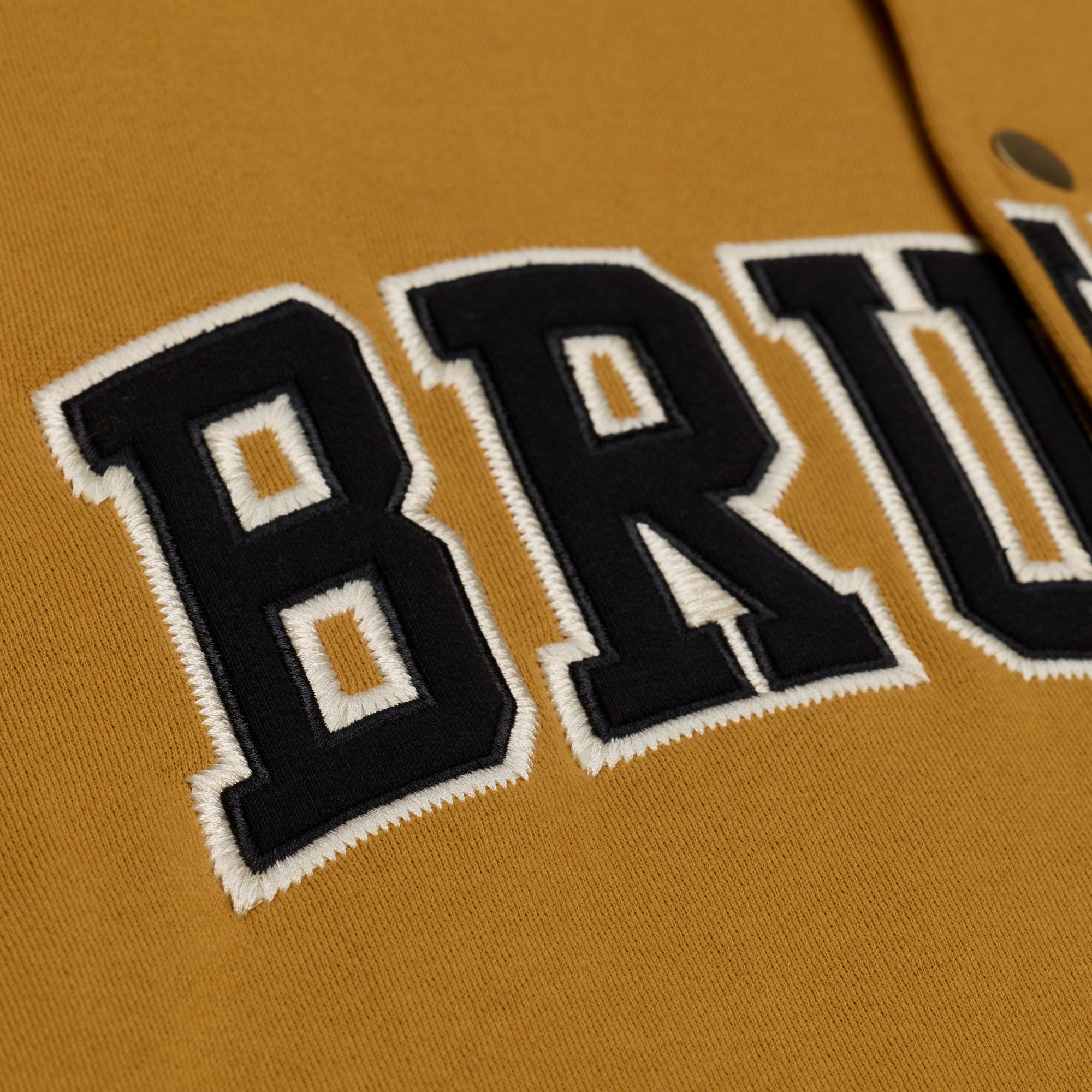 Mitchell & Ness Men's Boston Bruins Tan Dusted Varsity Jacket product image