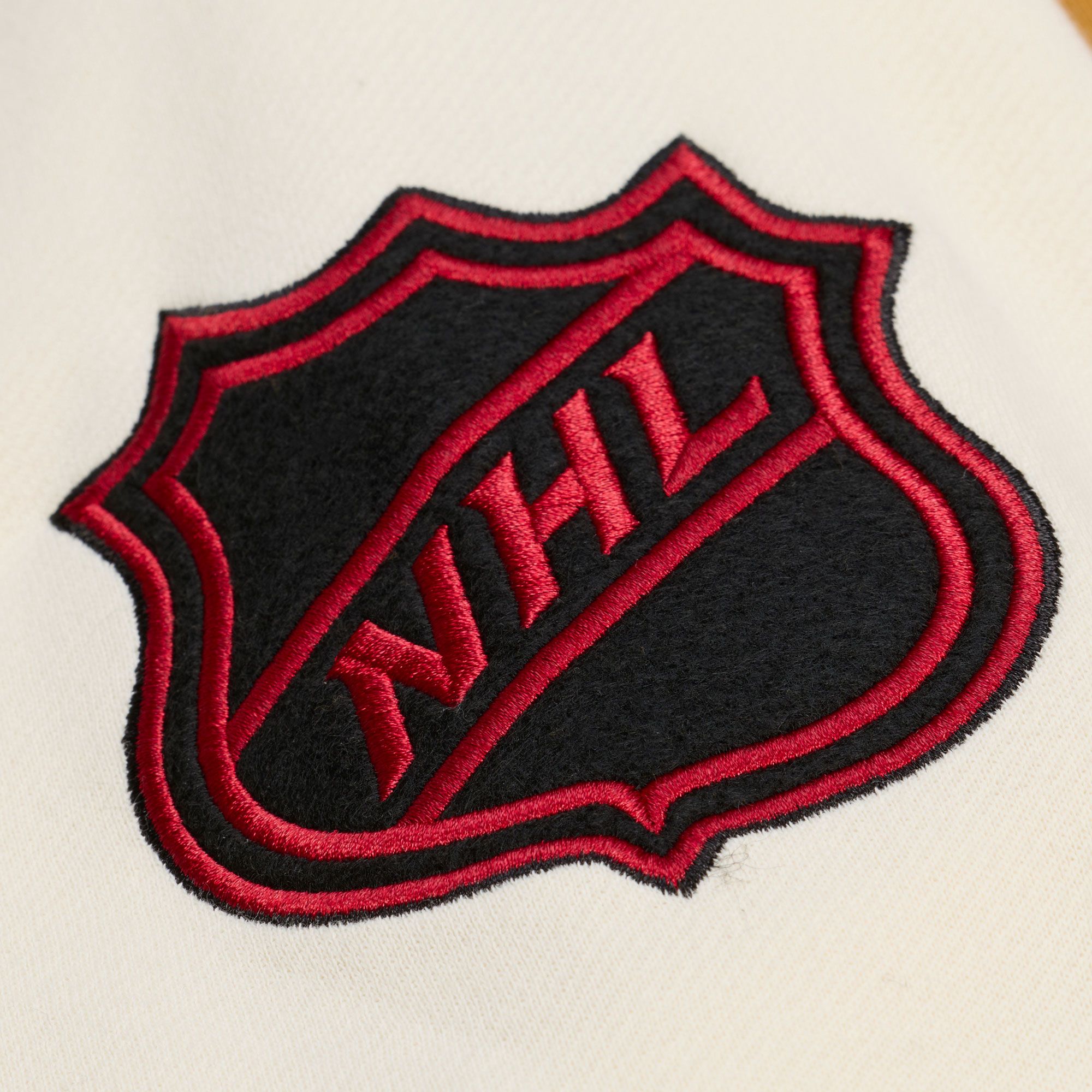 Mitchell & Ness Men's Chicago Blackhawks Tan Dusted Varsity Jacket product image