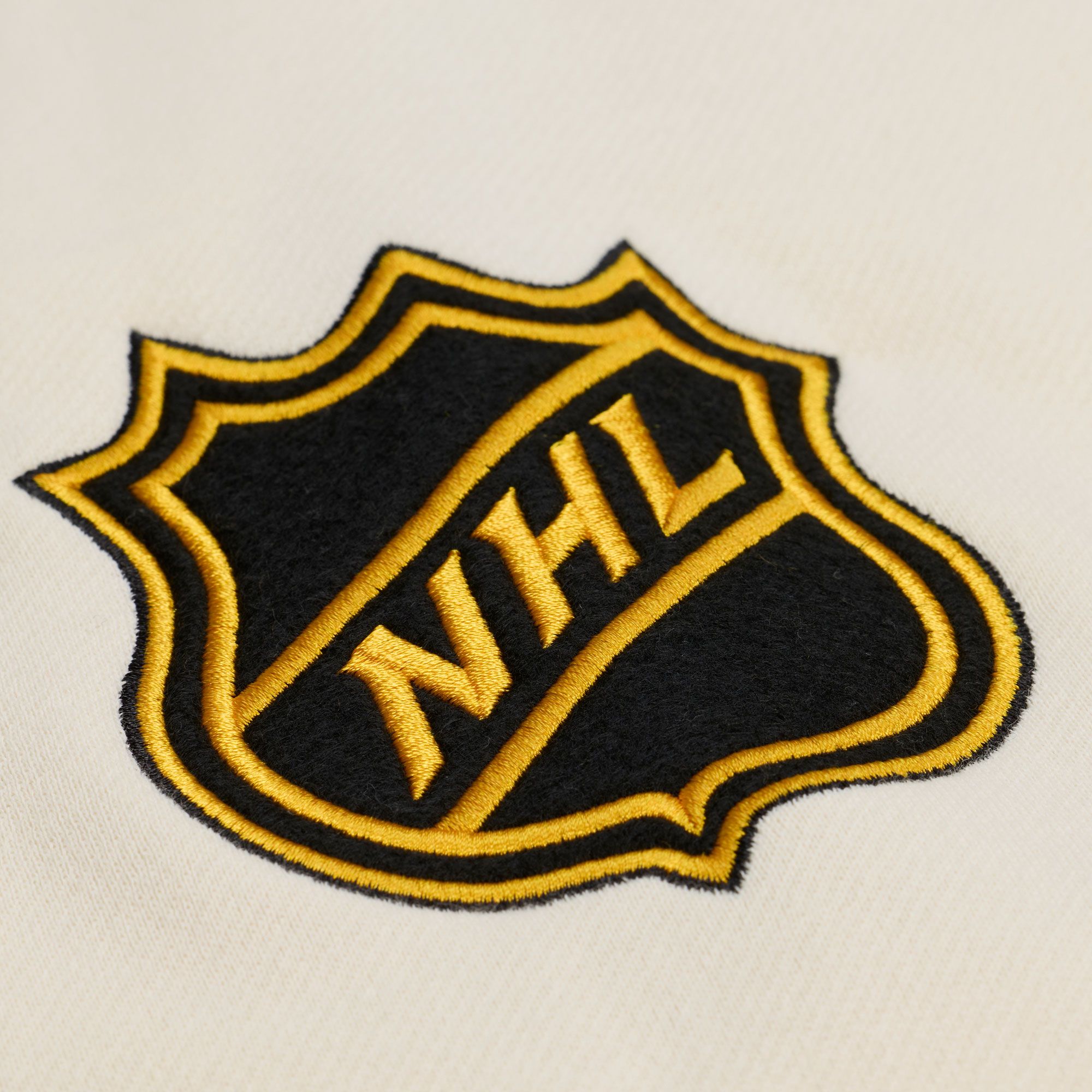 Mitchell & Ness Men's Pittsburgh Penguins Tan Dusted Varsity Jacket product image