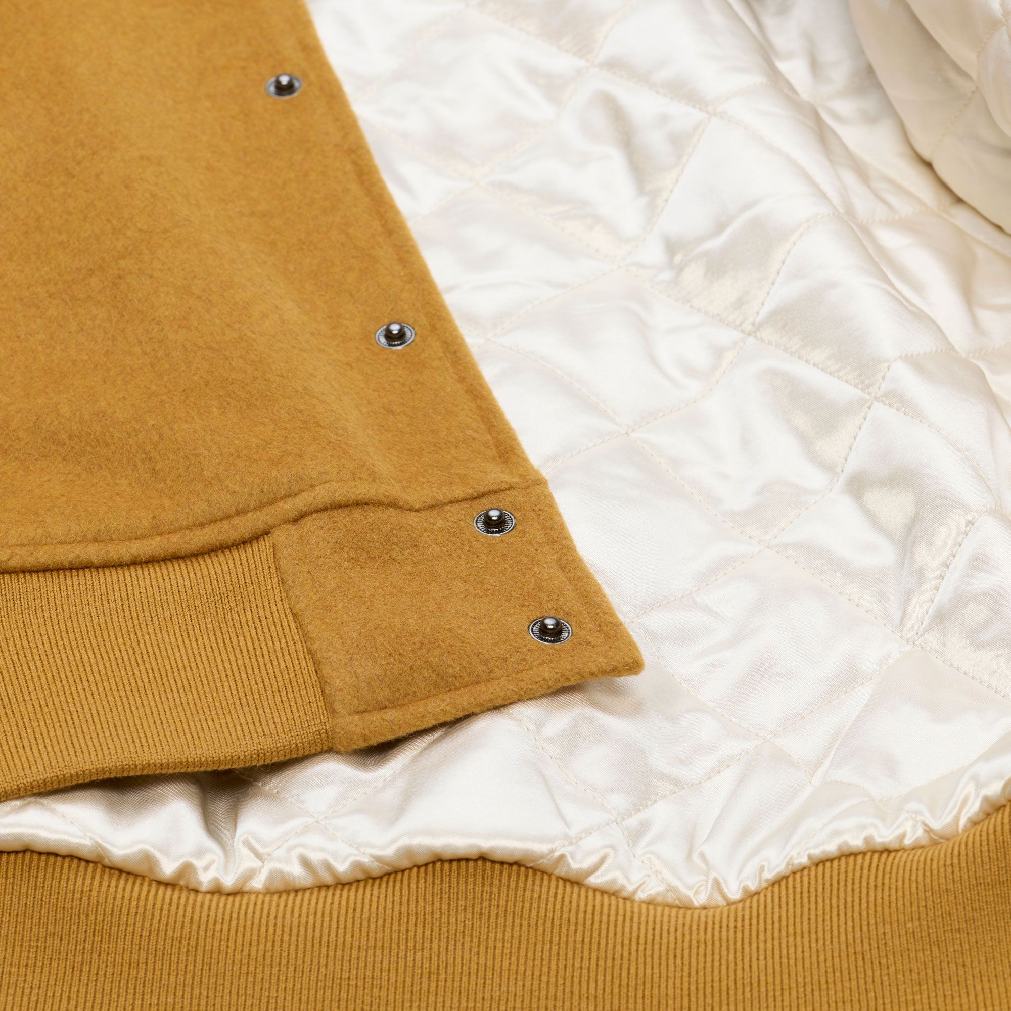 Mitchell & Ness Men's Boston Bruins Tan Dusted Varsity Jacket product image