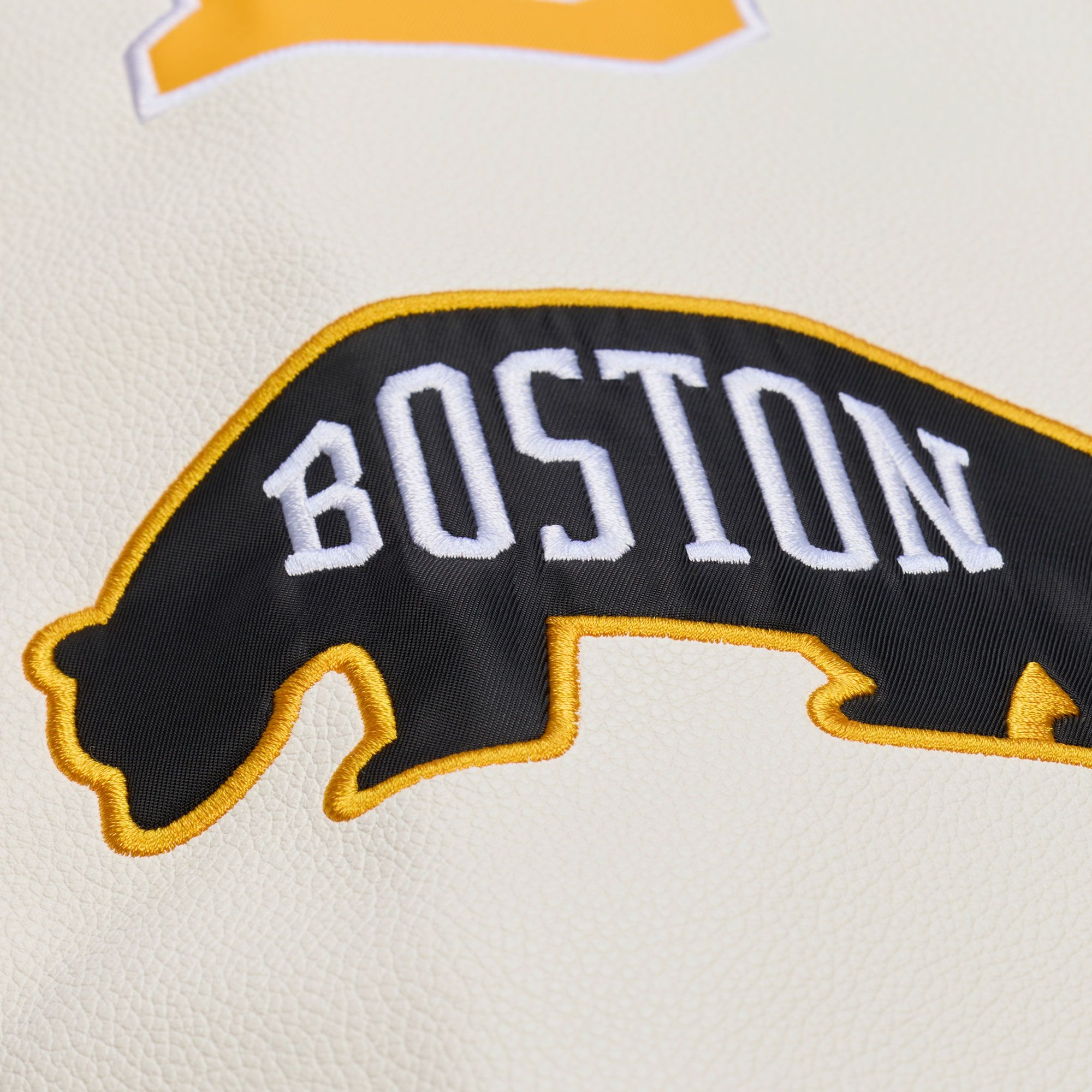 Mitchell & Ness Men's Boston Bruins Tan Dusted Varsity Jacket product image