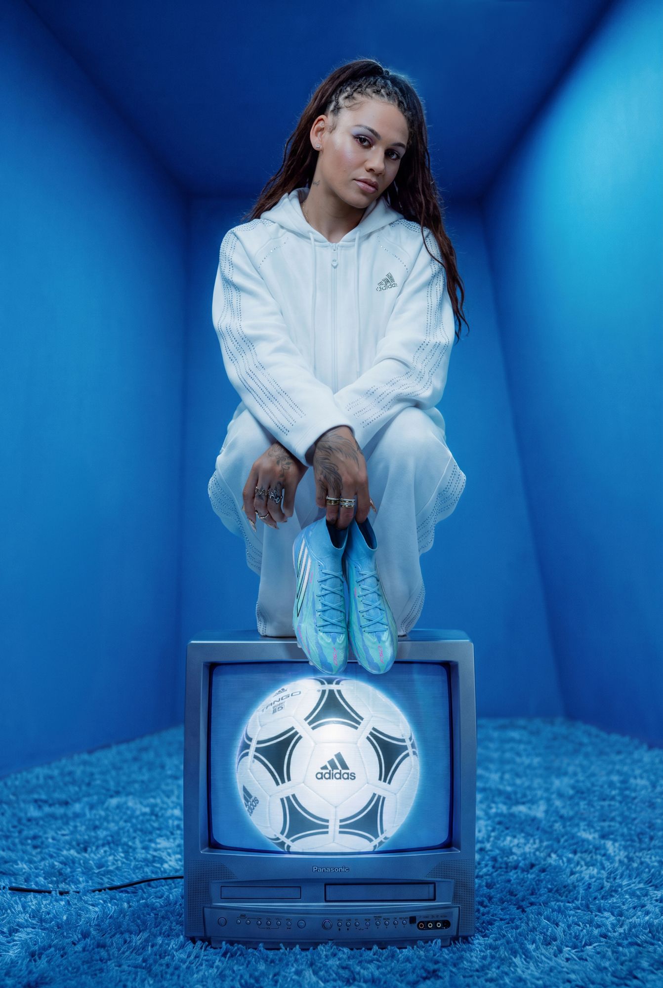 adidas Women's F50 Sparkfusion Elite Trinity Rodman Mid FG Soccer Cleats product image